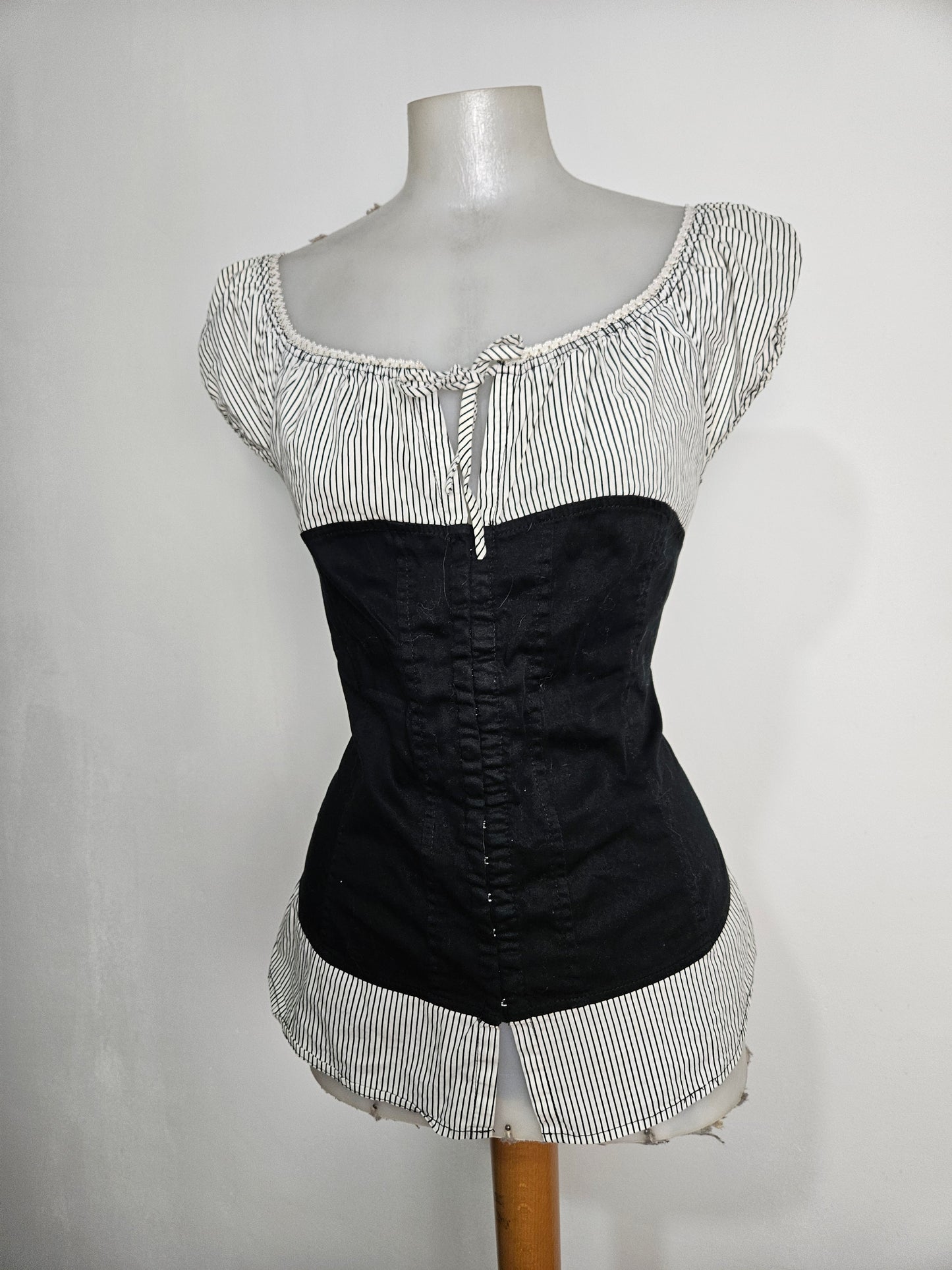 Haut effet superposition fermeture agrafes