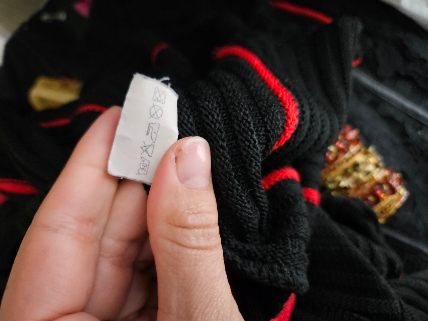 Pull rouge et noir double zip