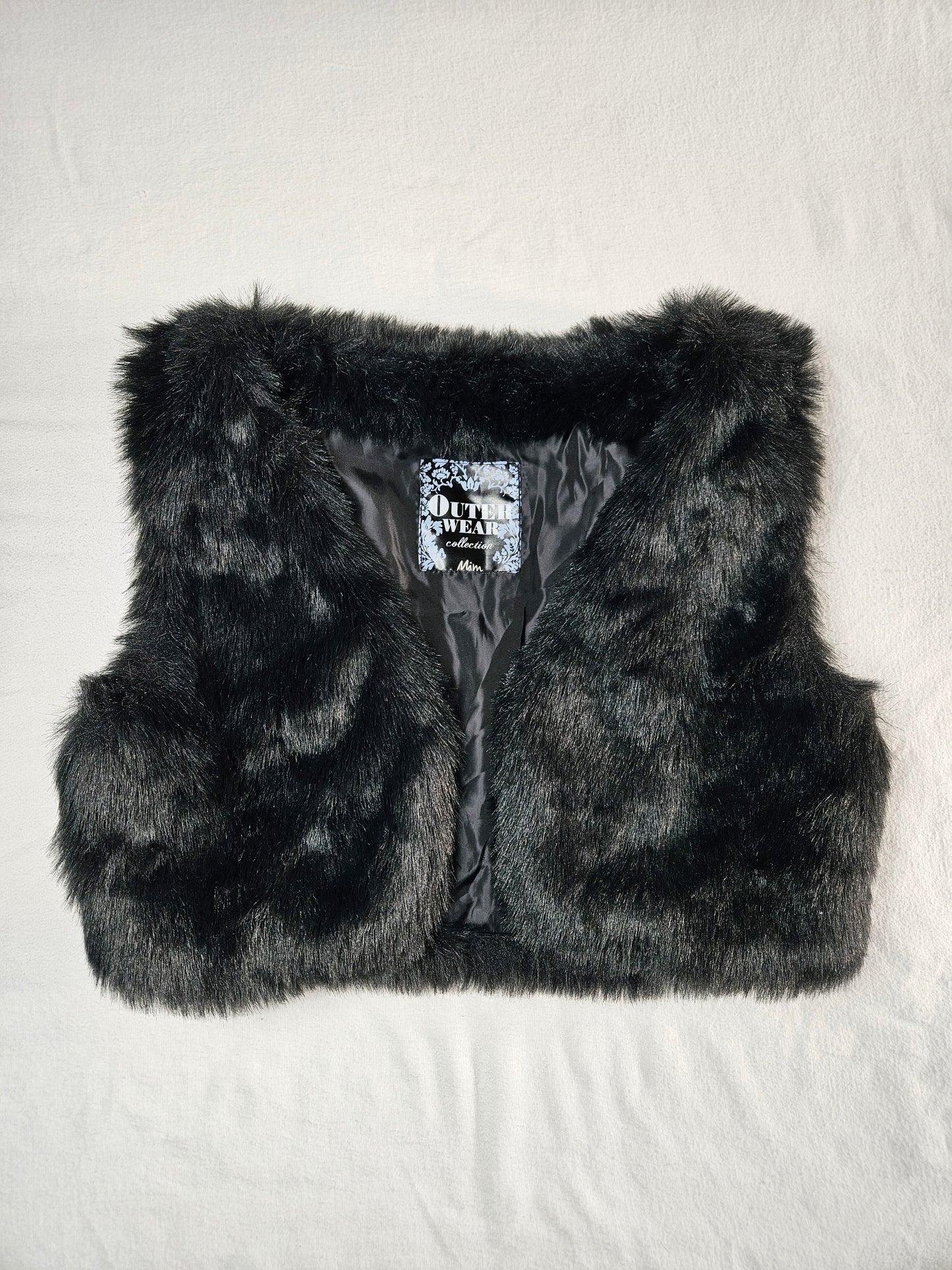 Boléro fausse fourrure