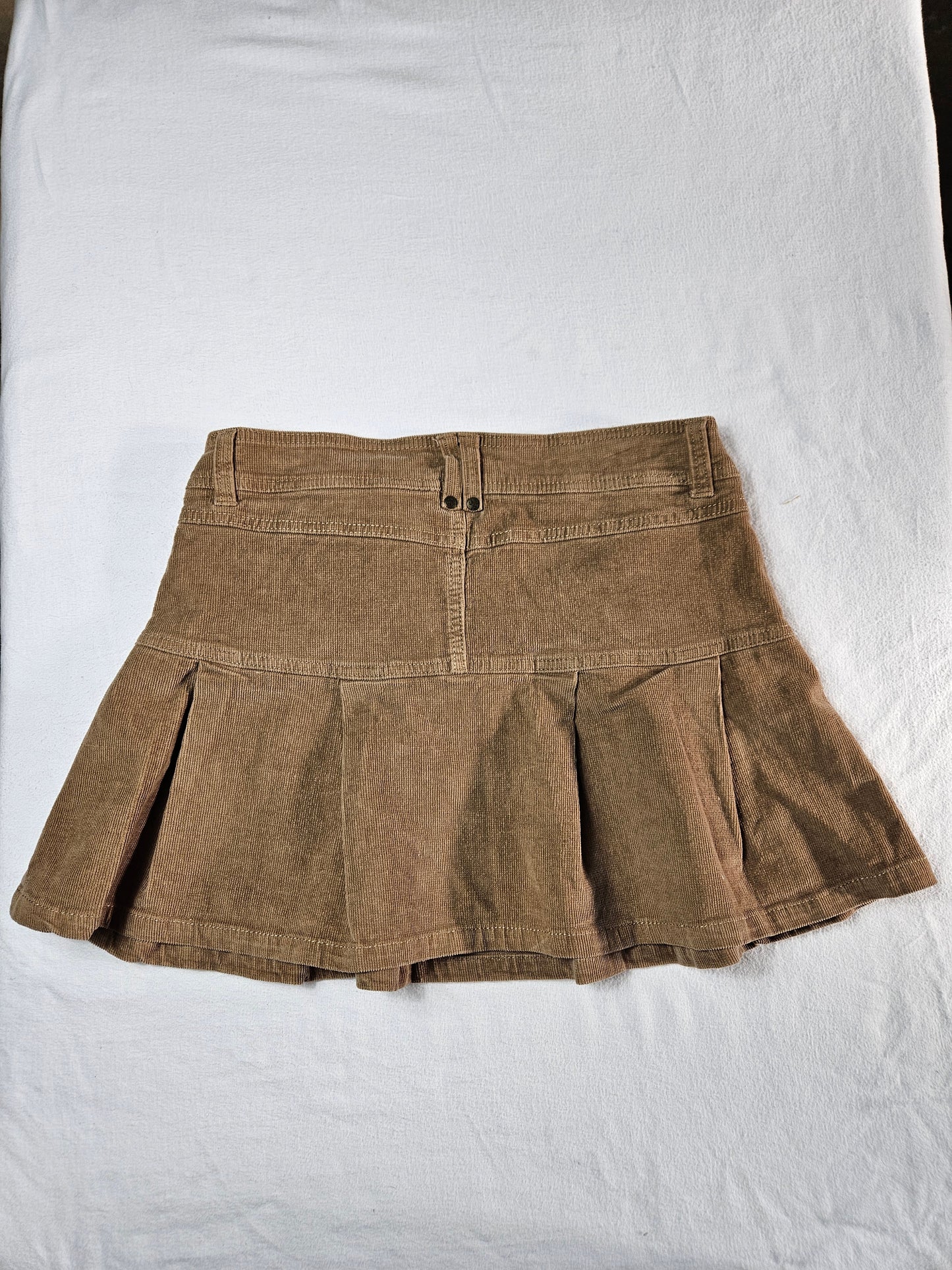 Mini jupe plissée en velours