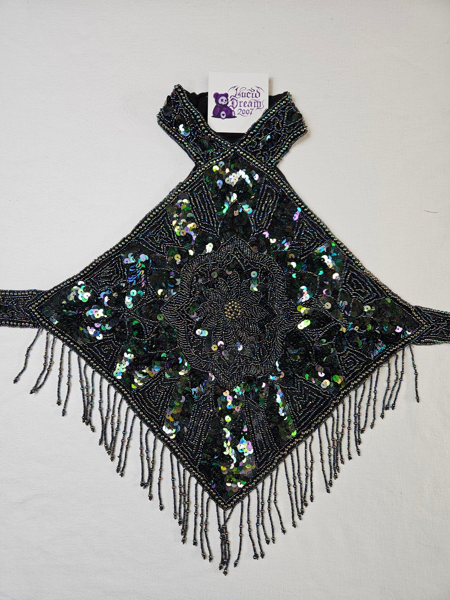 Dos nu brodé de sequins noir et vert