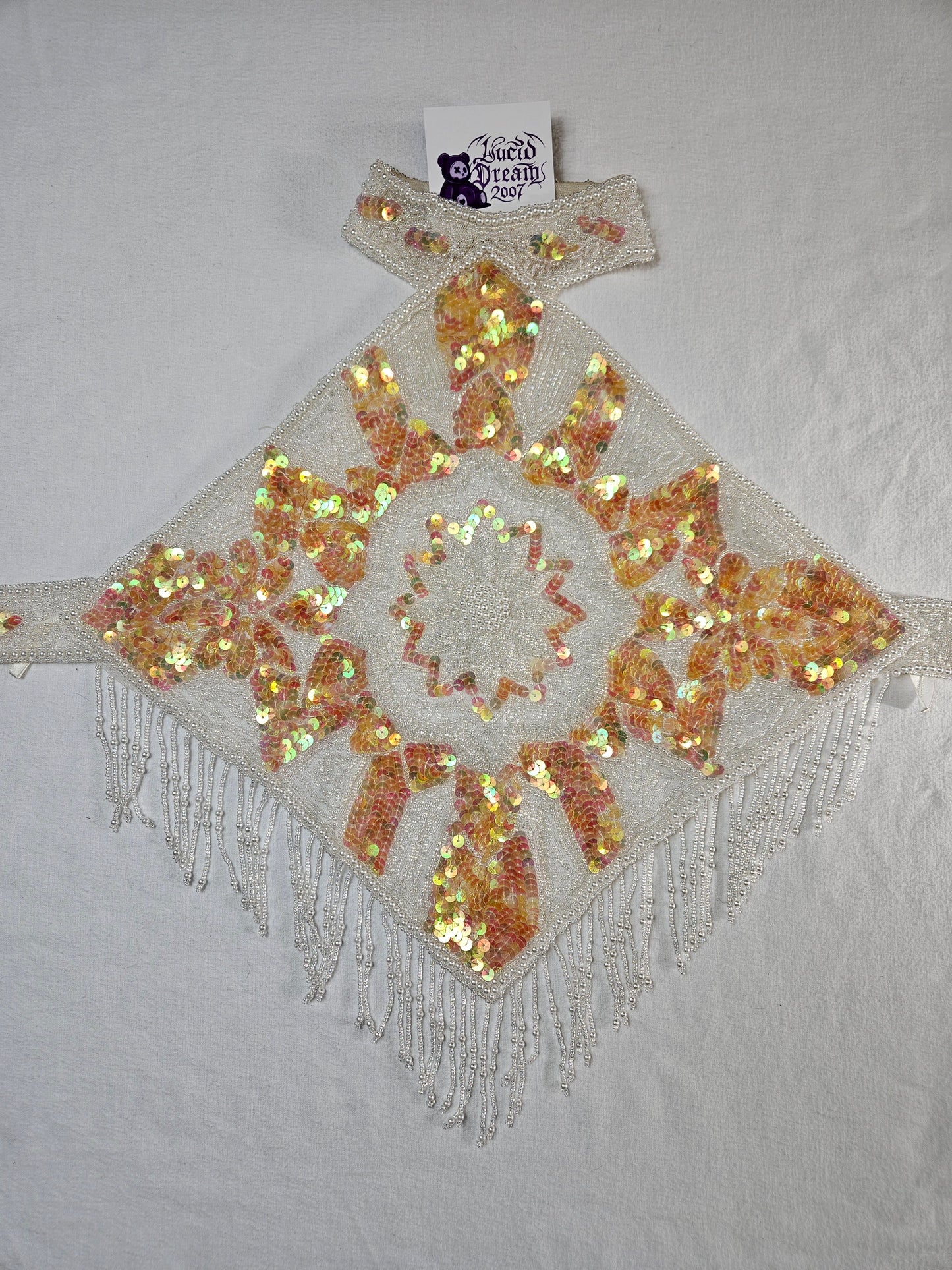 Haut dos nu brodé blanc et doré