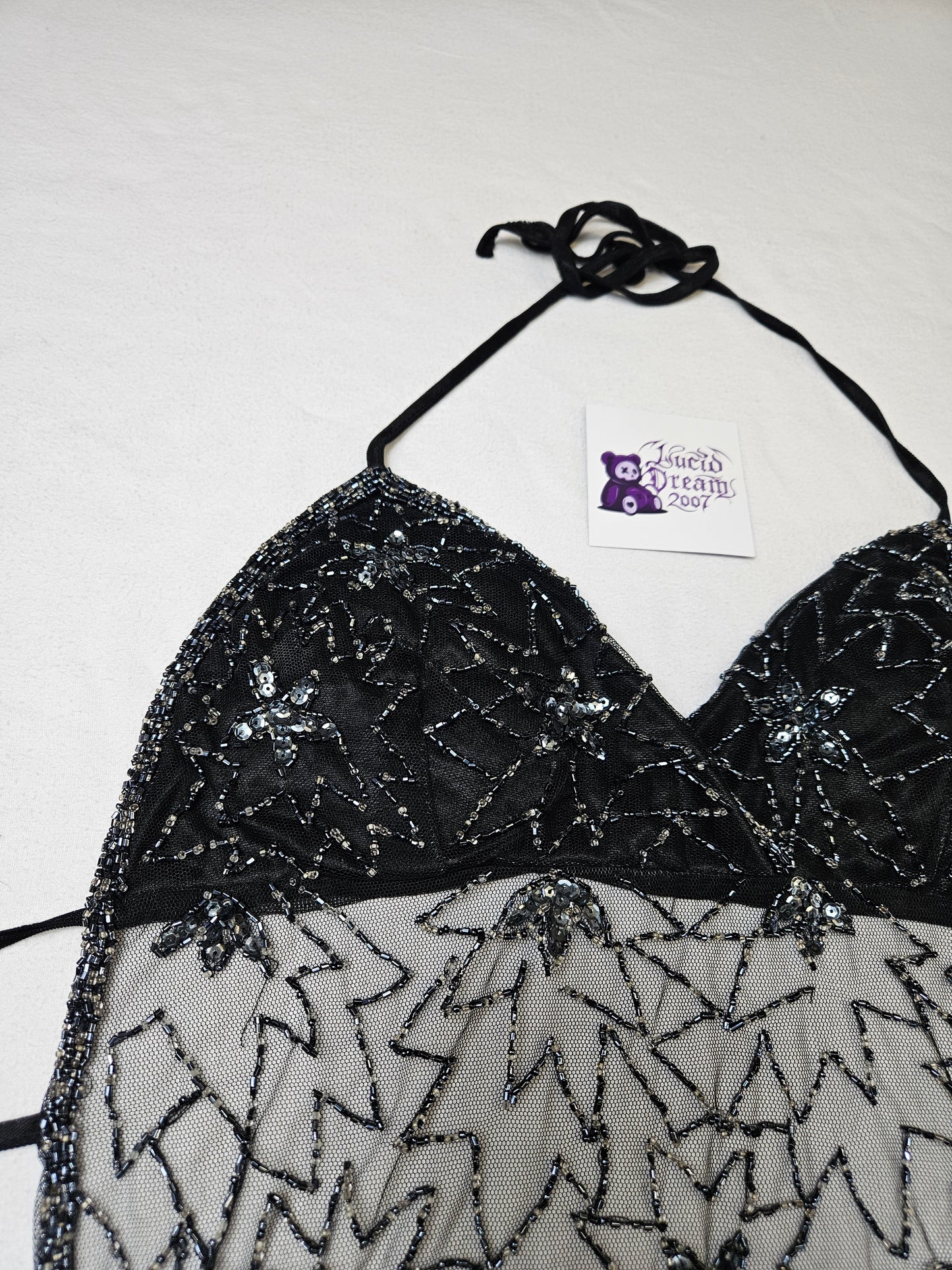 Haut dos nu en voile brodé