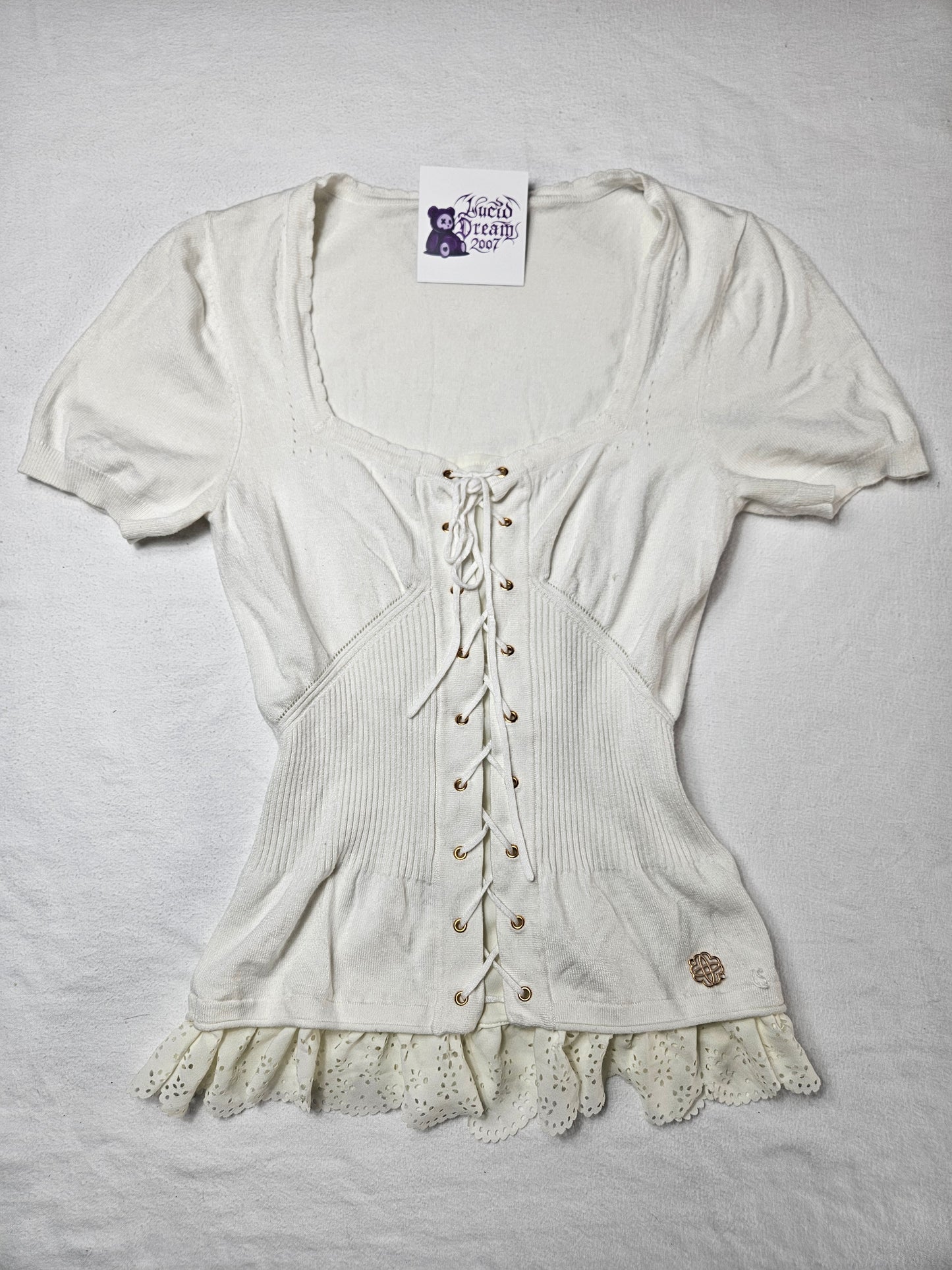 Haut blanc à laçage