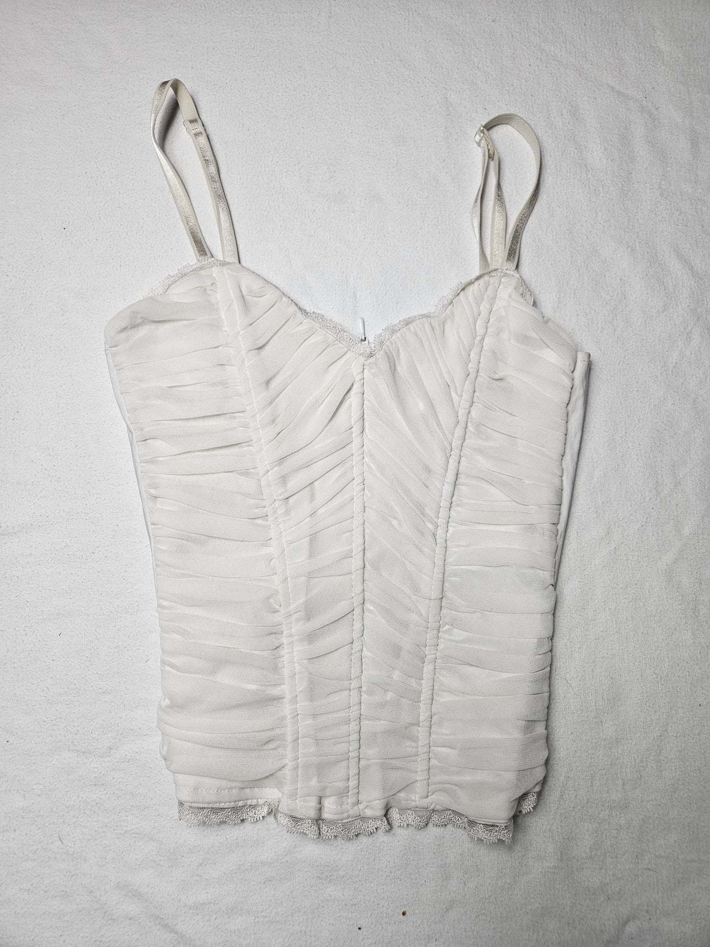 Haut à baleines en voile plissé