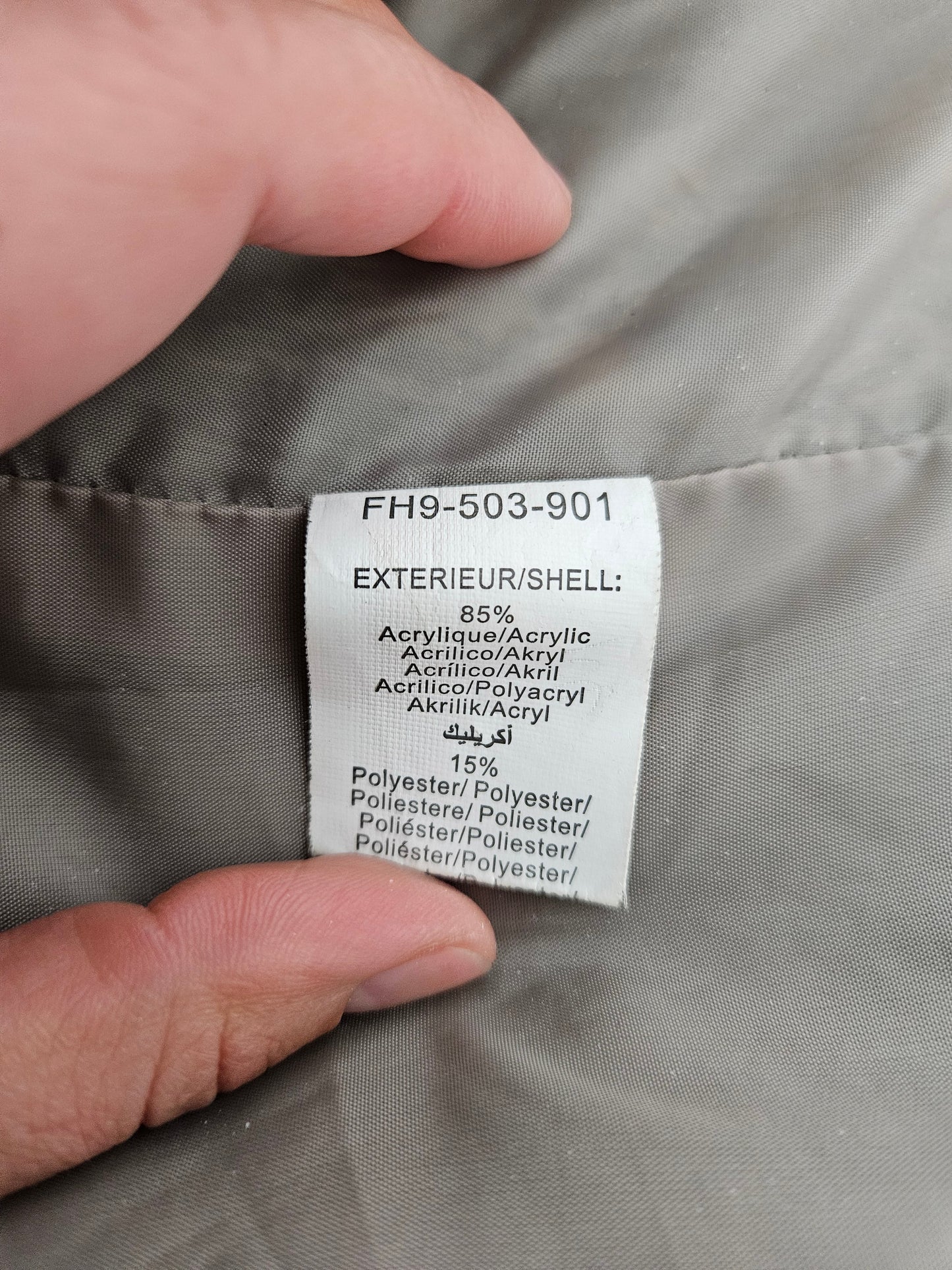 Manteau court fausse fourrure