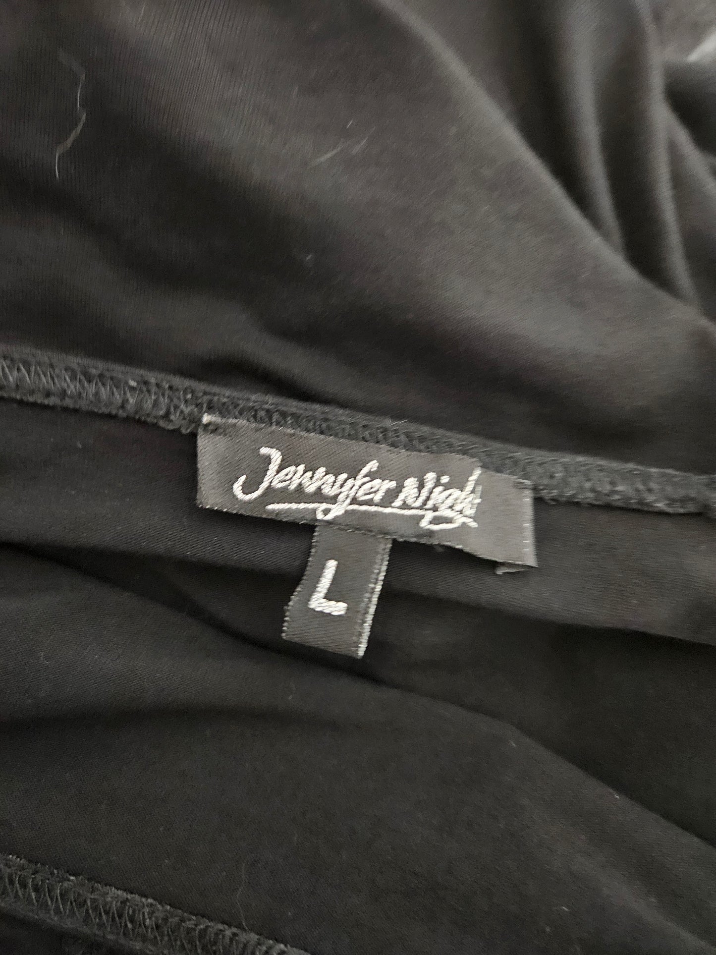 Jupe asymétrique noire à boucle