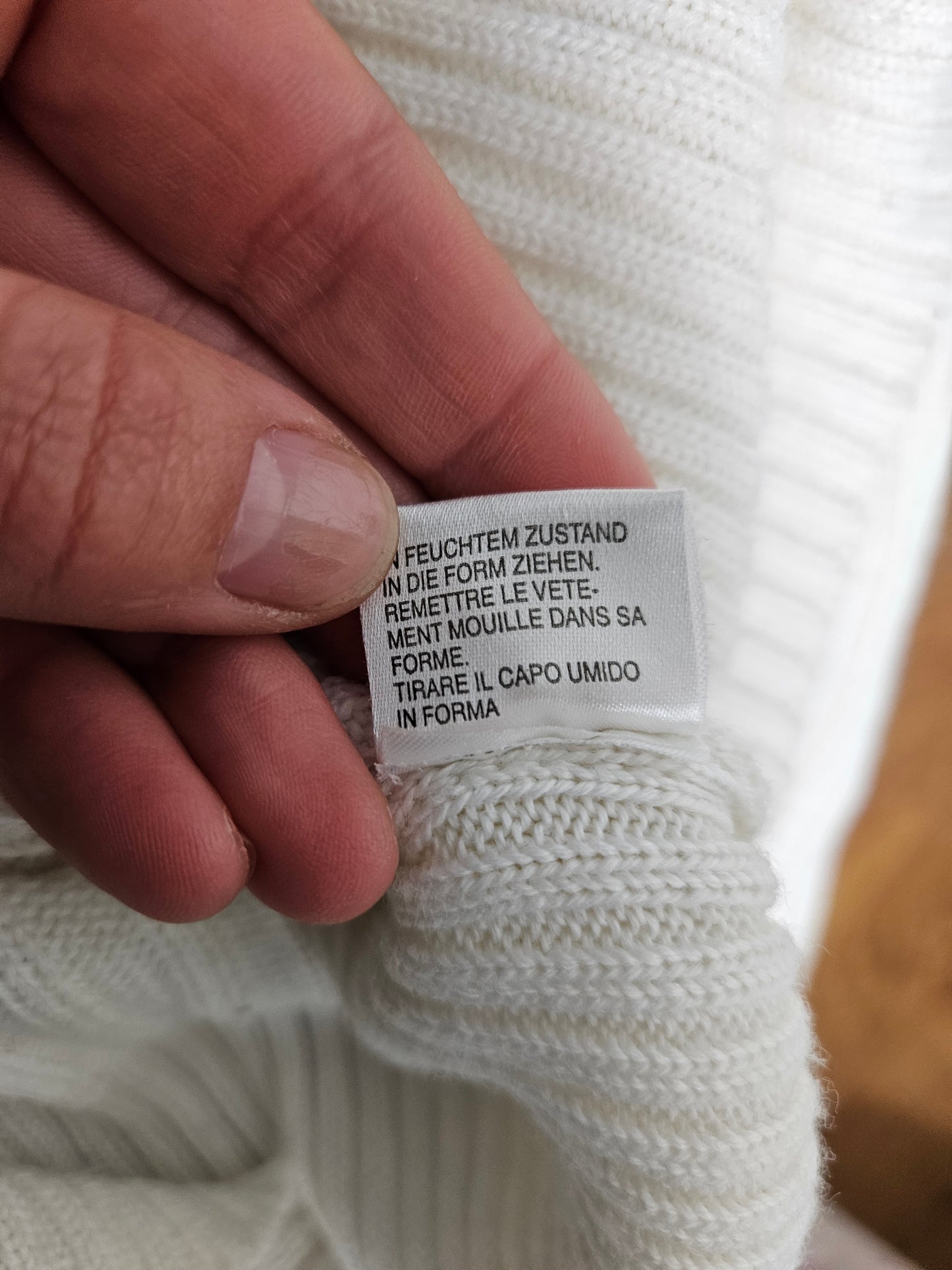 Pull col roulé à boucle