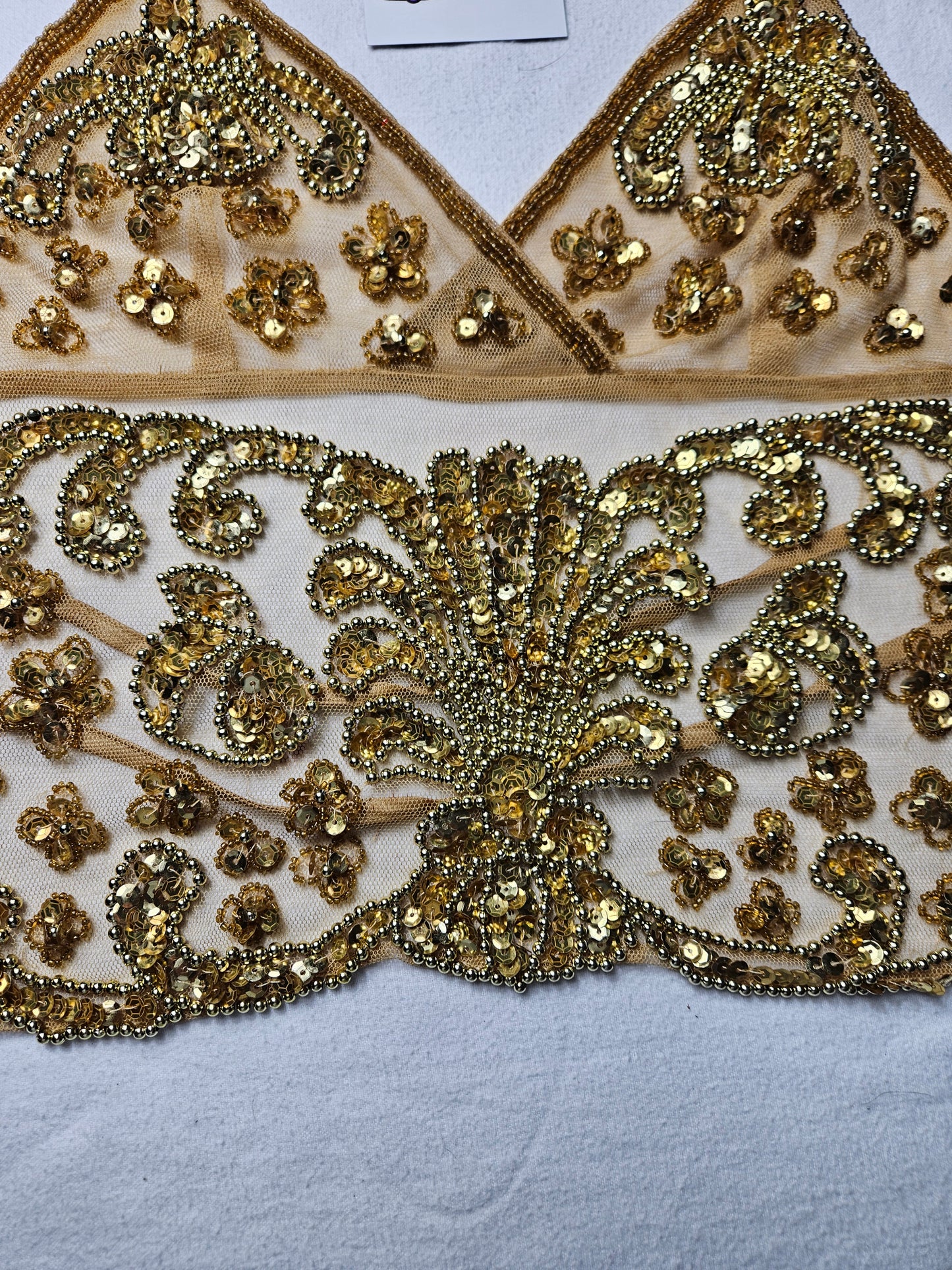 Open back in gold embroidered voile