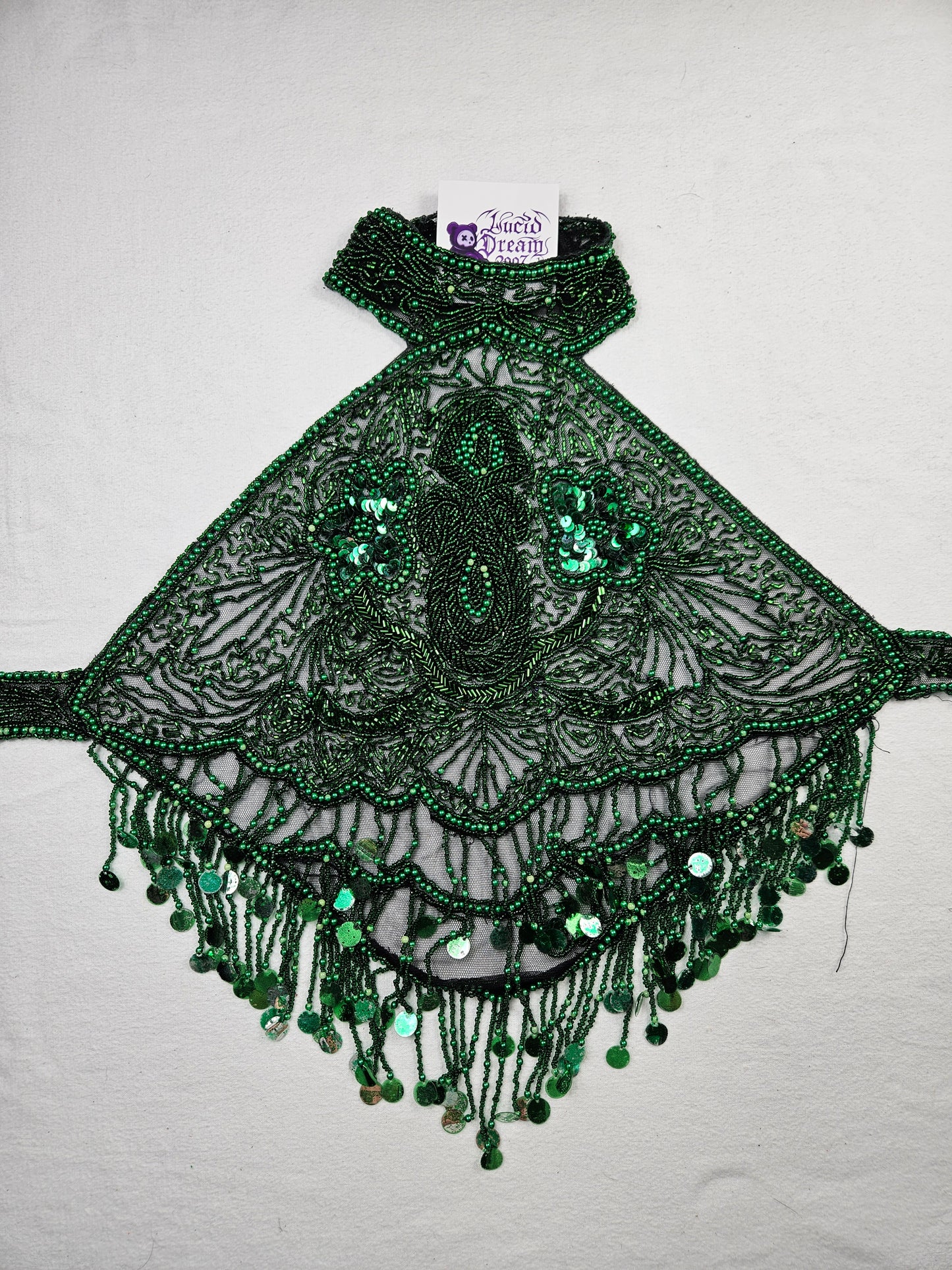 Dos nu brodé de sequins vert et noir