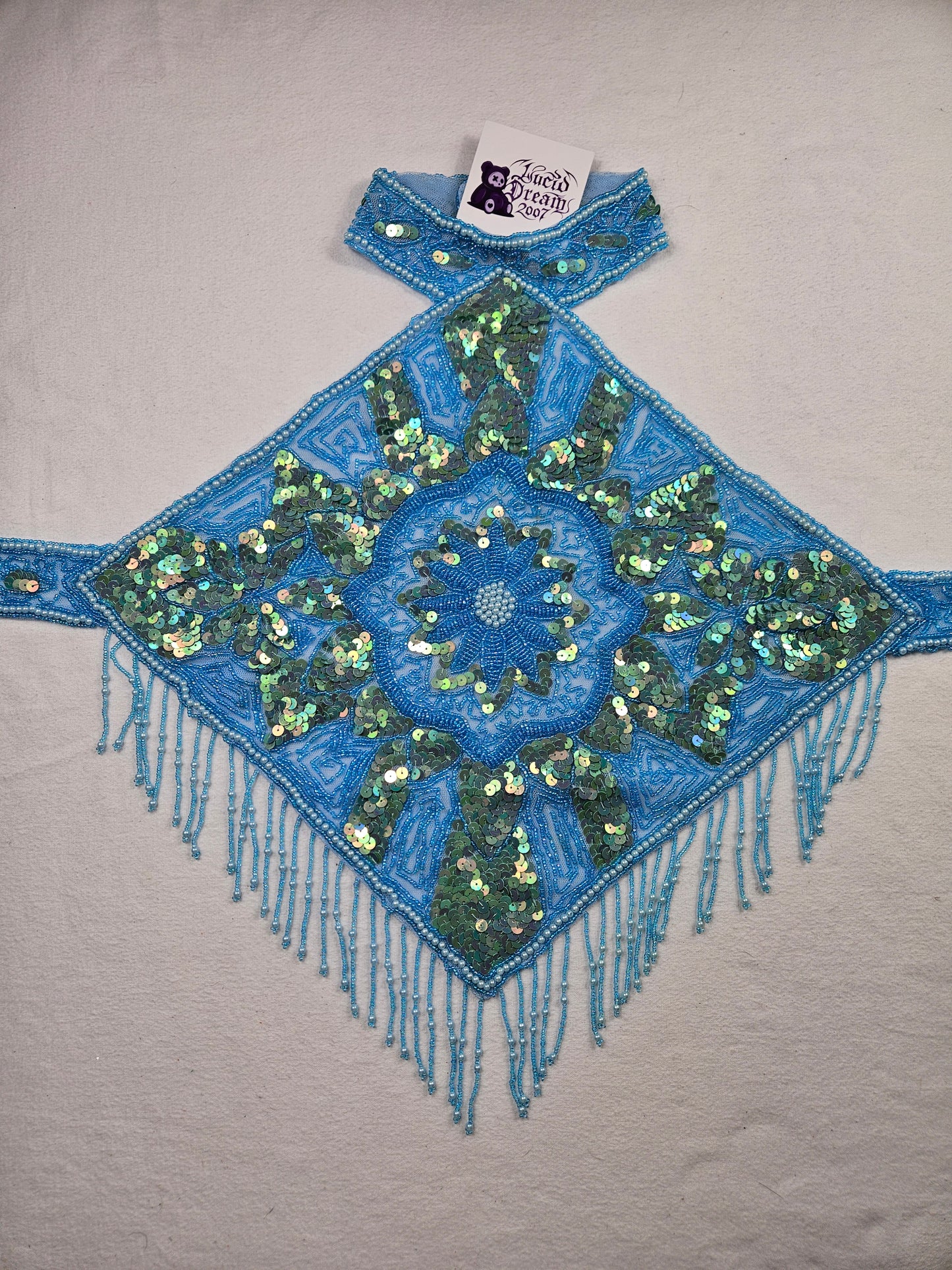 Espalda abierta bordada en azul claro