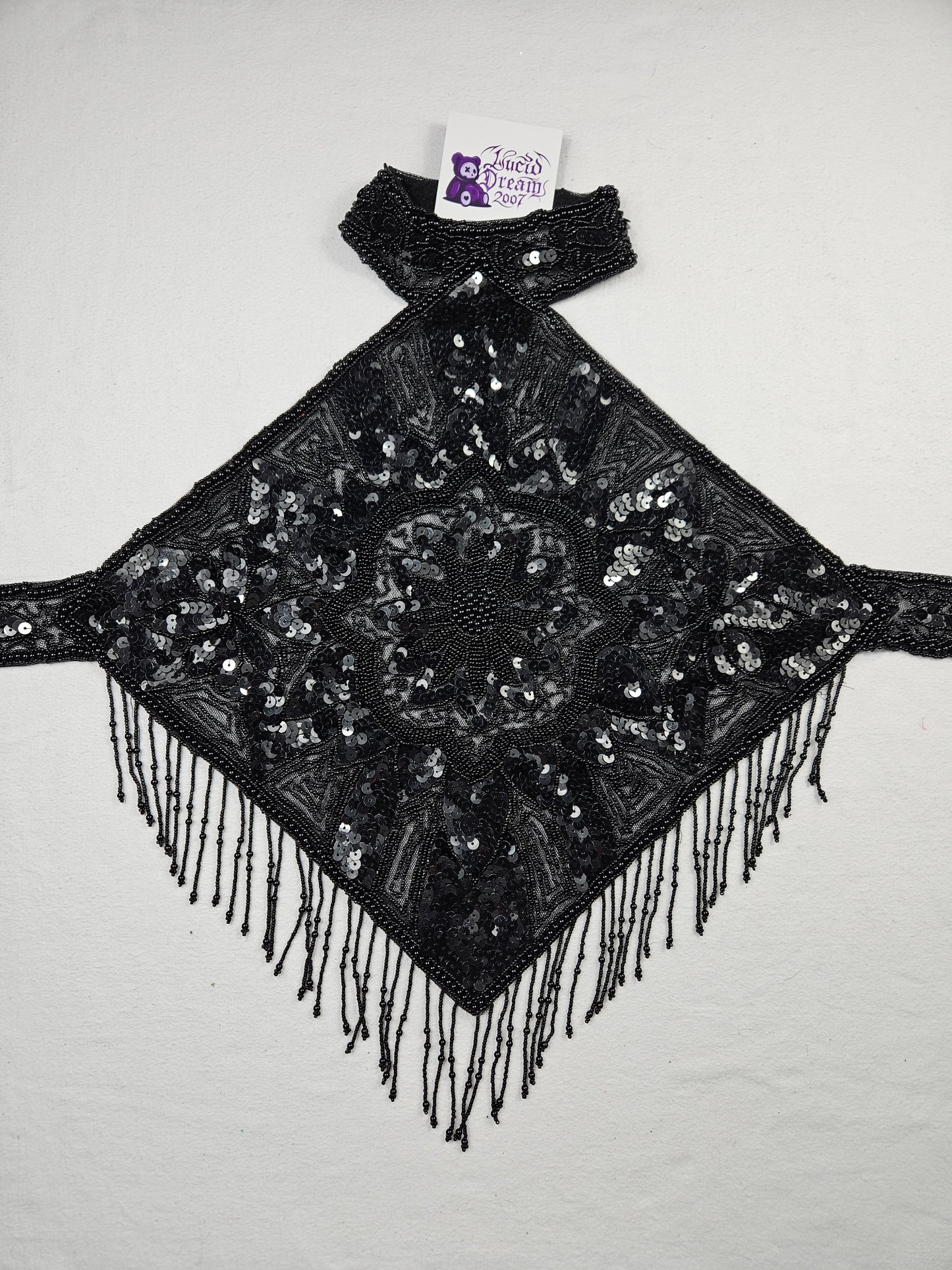 Black open back embroidered with sequins