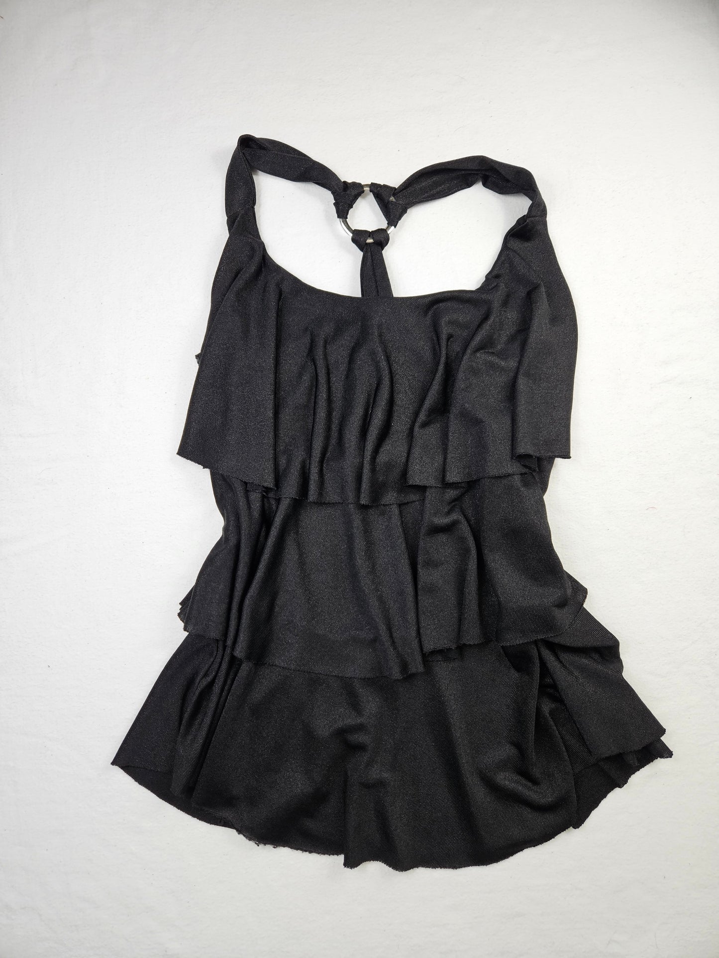 High-backed, ruffled top