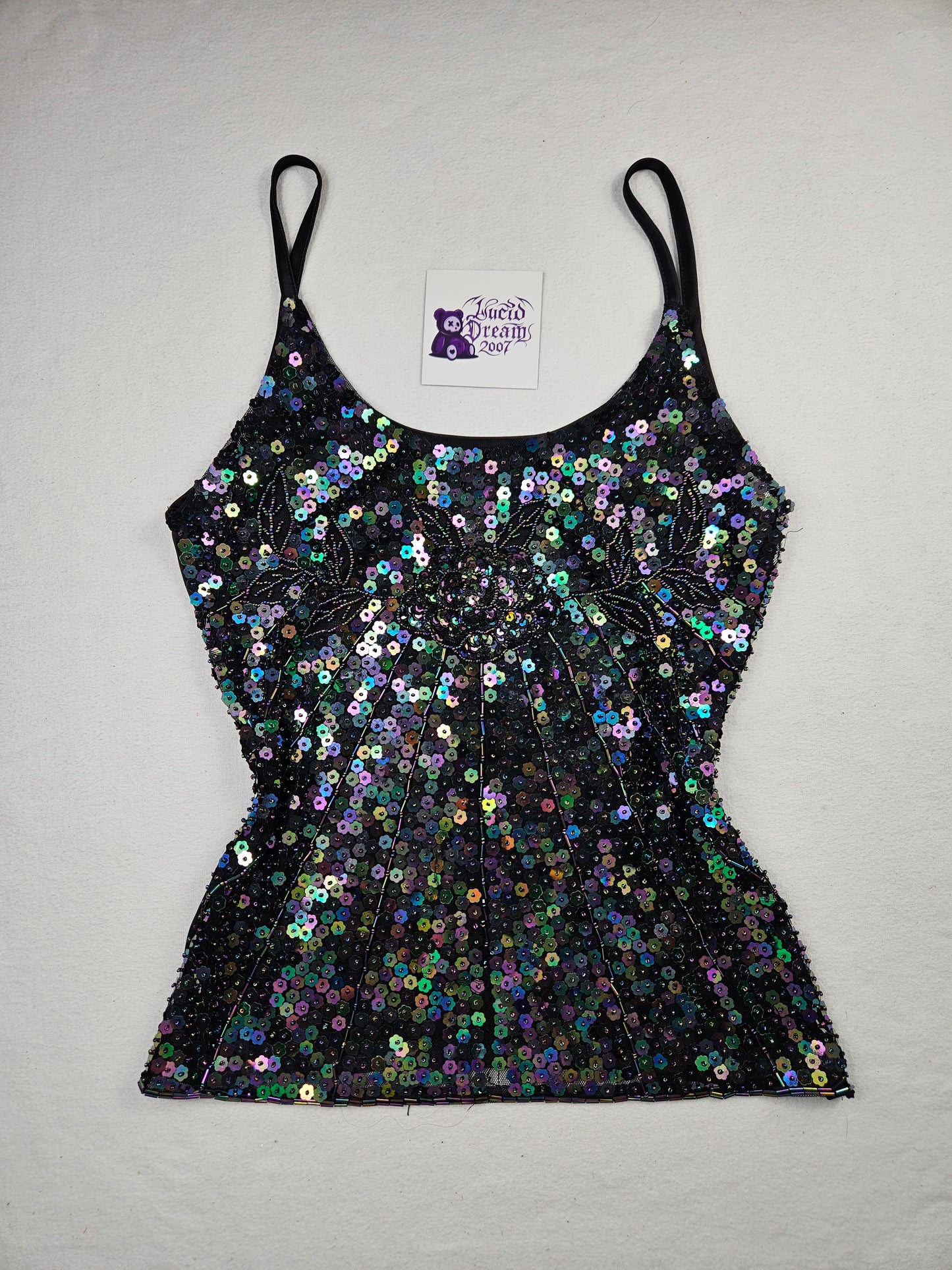 Top negro con lentejuelas multicolor