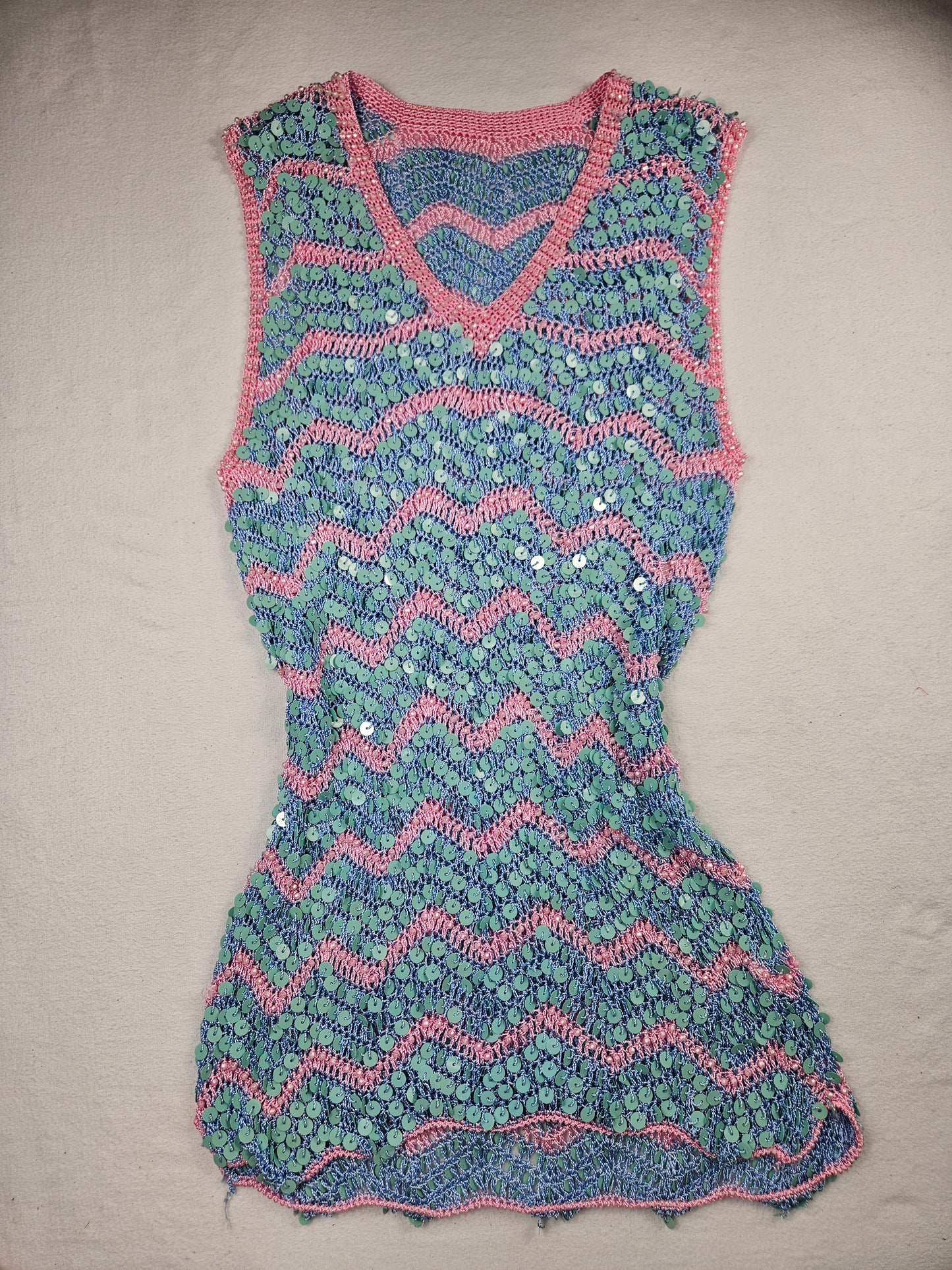Top de lentejuelas rosa y azul