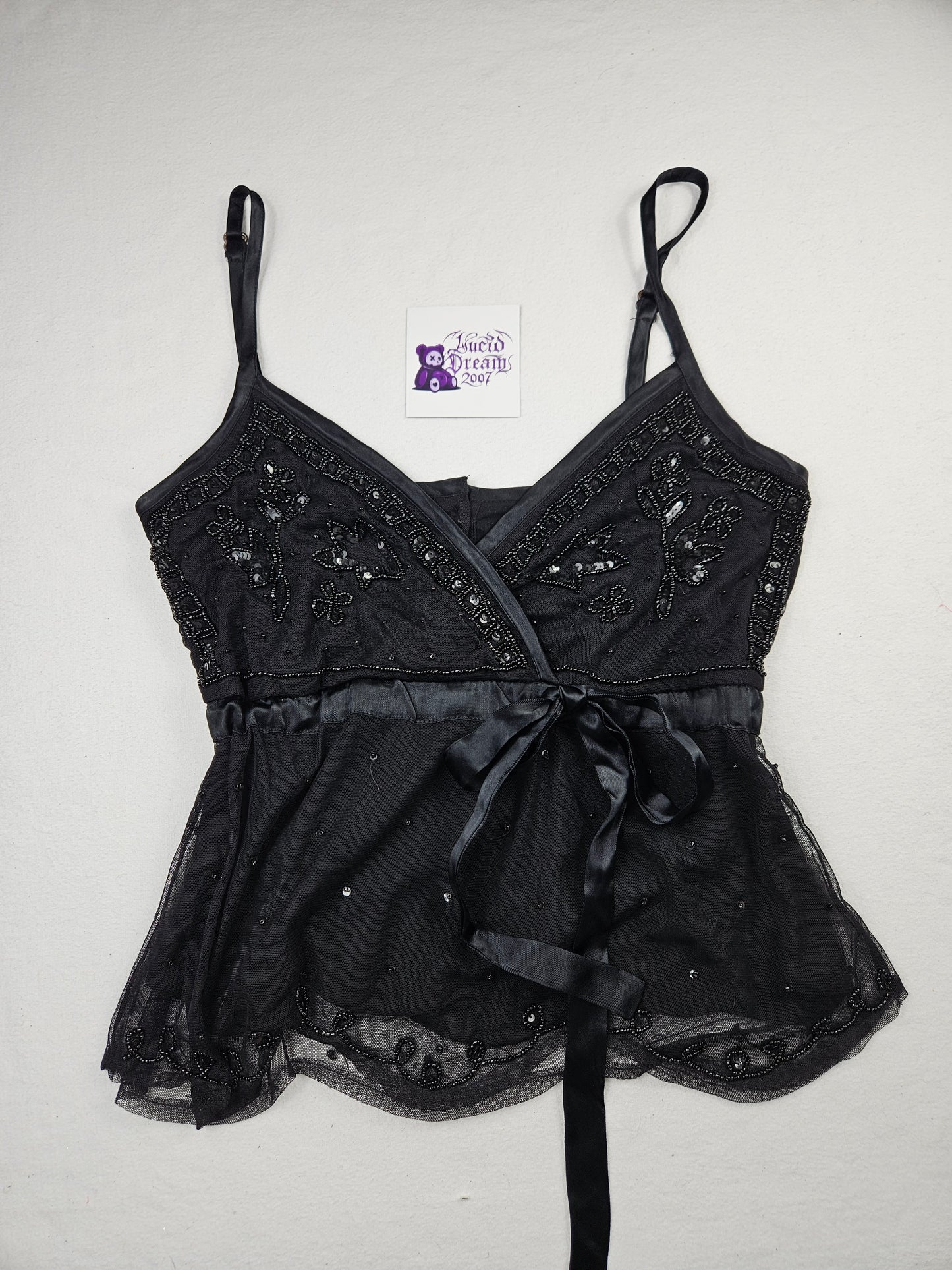Haut en voile et sequins noir