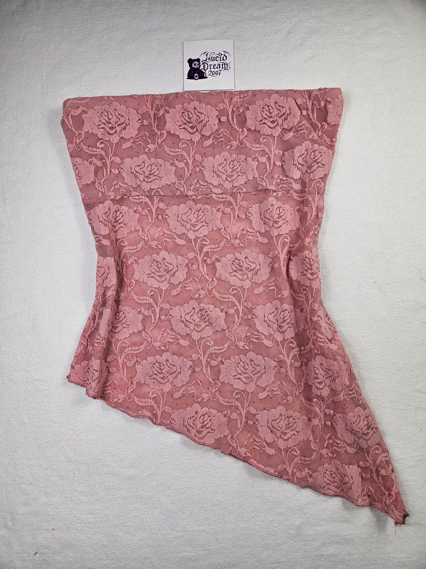 Top sin tirantes de encaje rosa