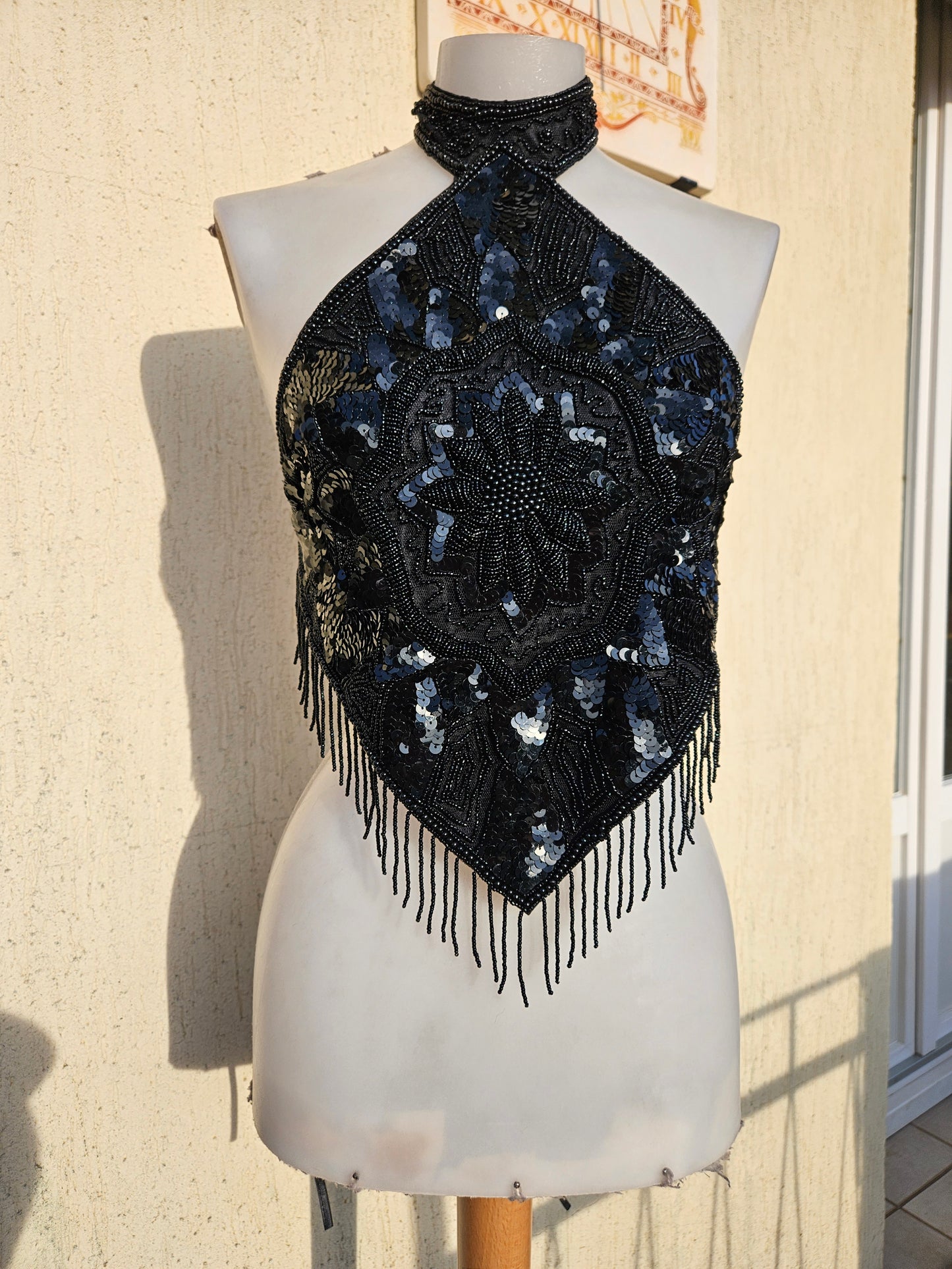 Black open back embroidered with sequins