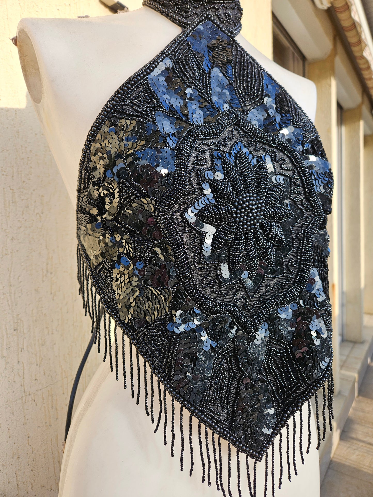 Black open back embroidered with sequins