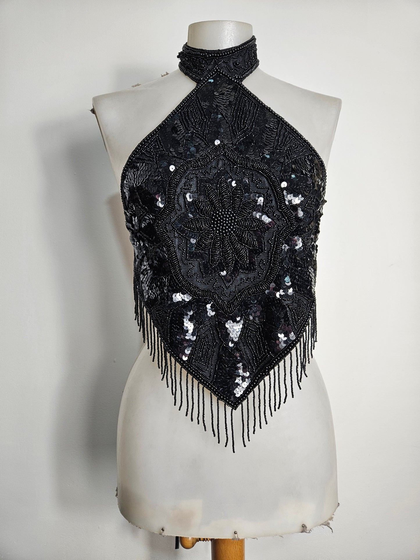Black open back embroidered with sequins