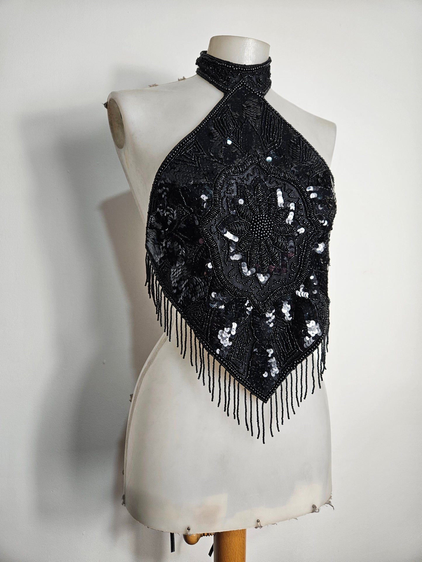 Black open back embroidered with sequins