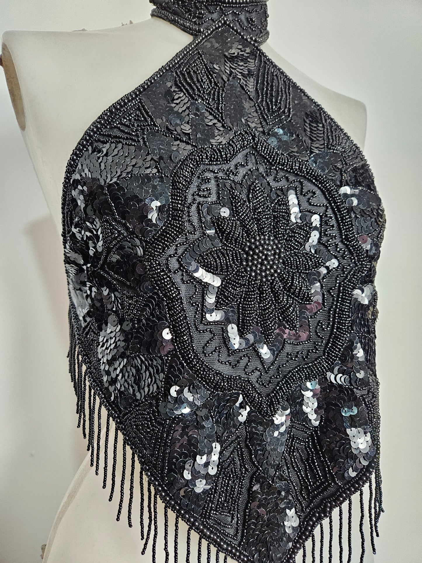 Black open back embroidered with sequins
