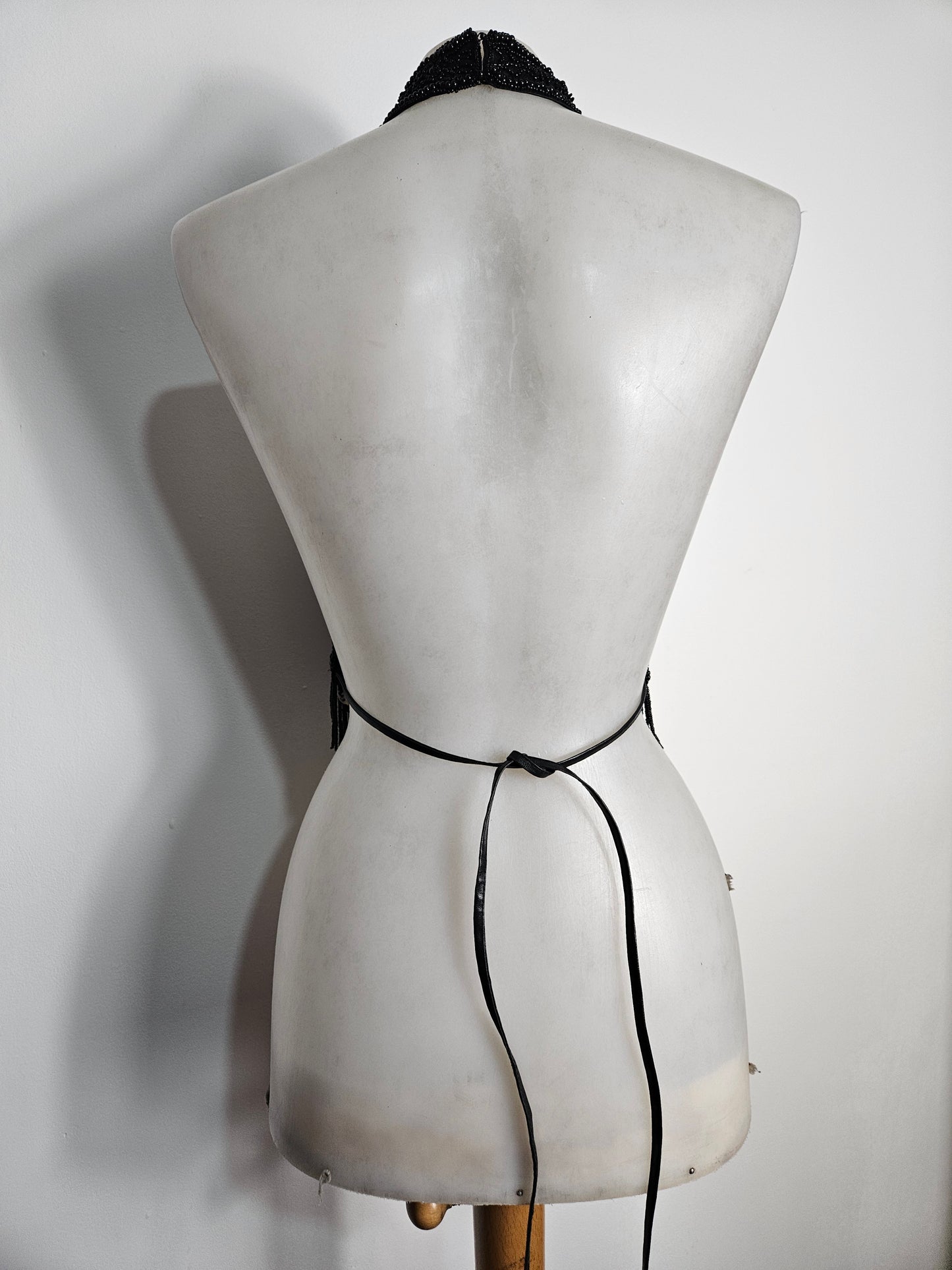 Black open back embroidered with sequins