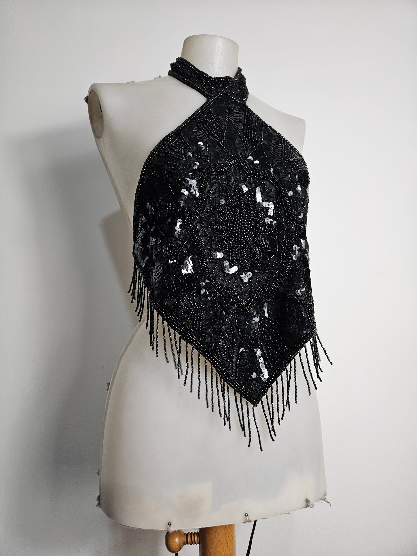 Black open back embroidered with sequins