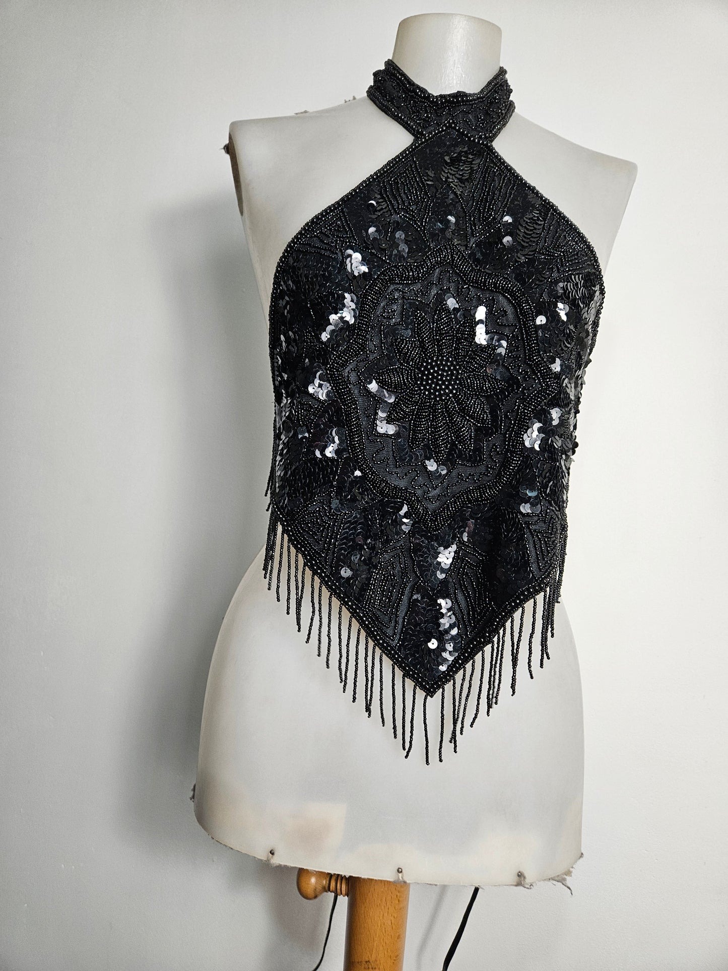 Black open back embroidered with sequins