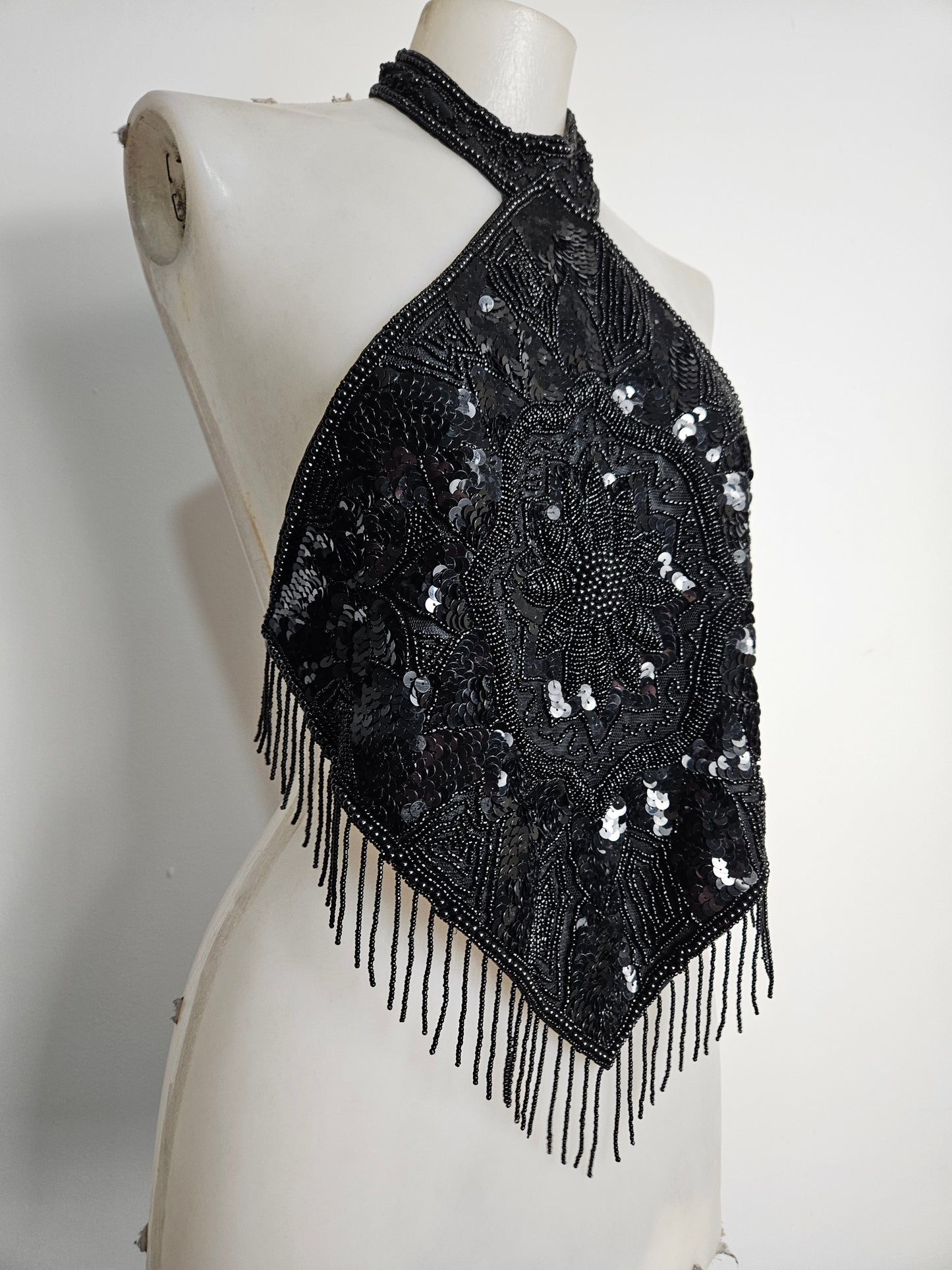 Black open back embroidered with sequins