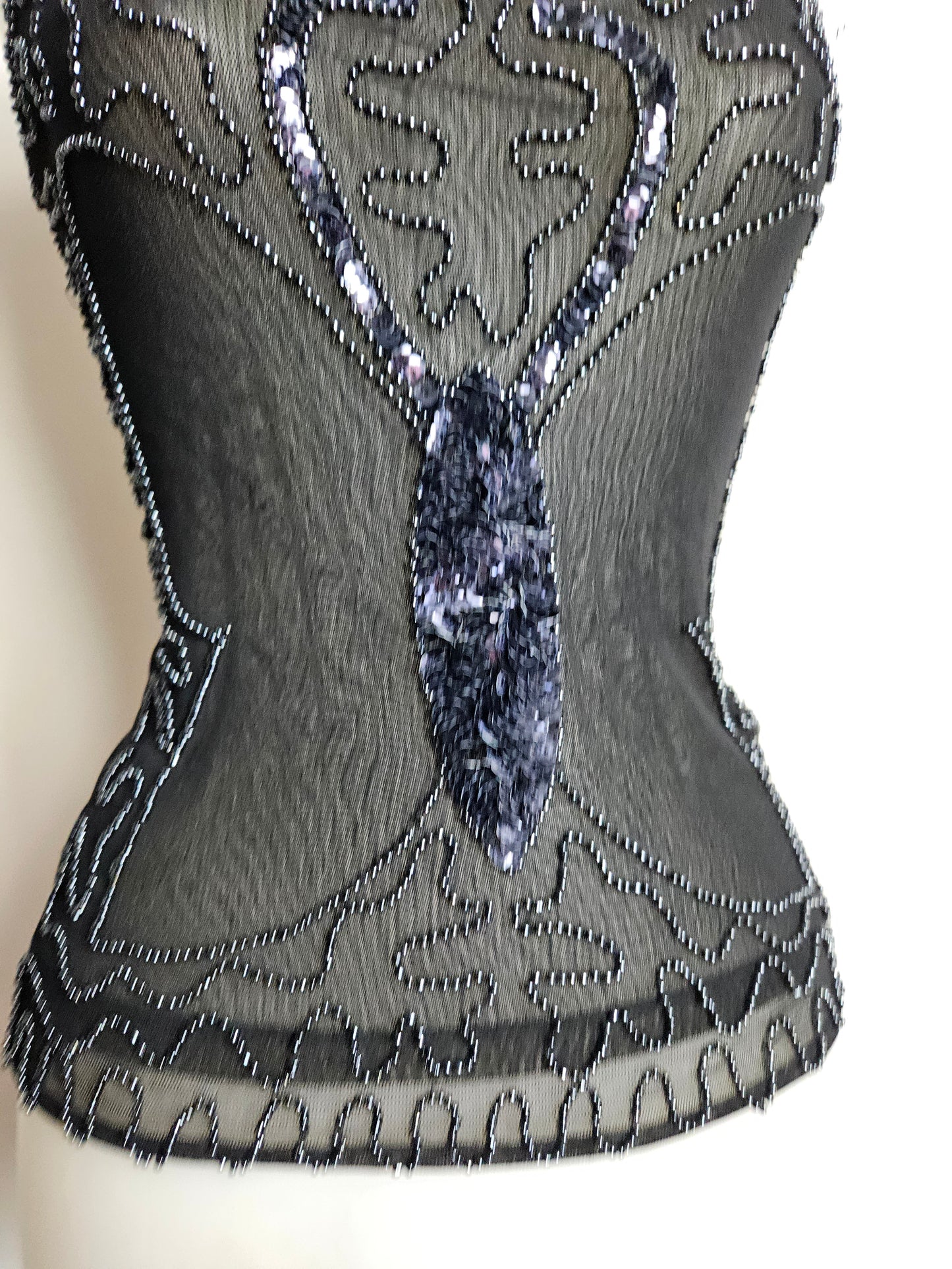 Top con estampado de mariposas y lentejuelas