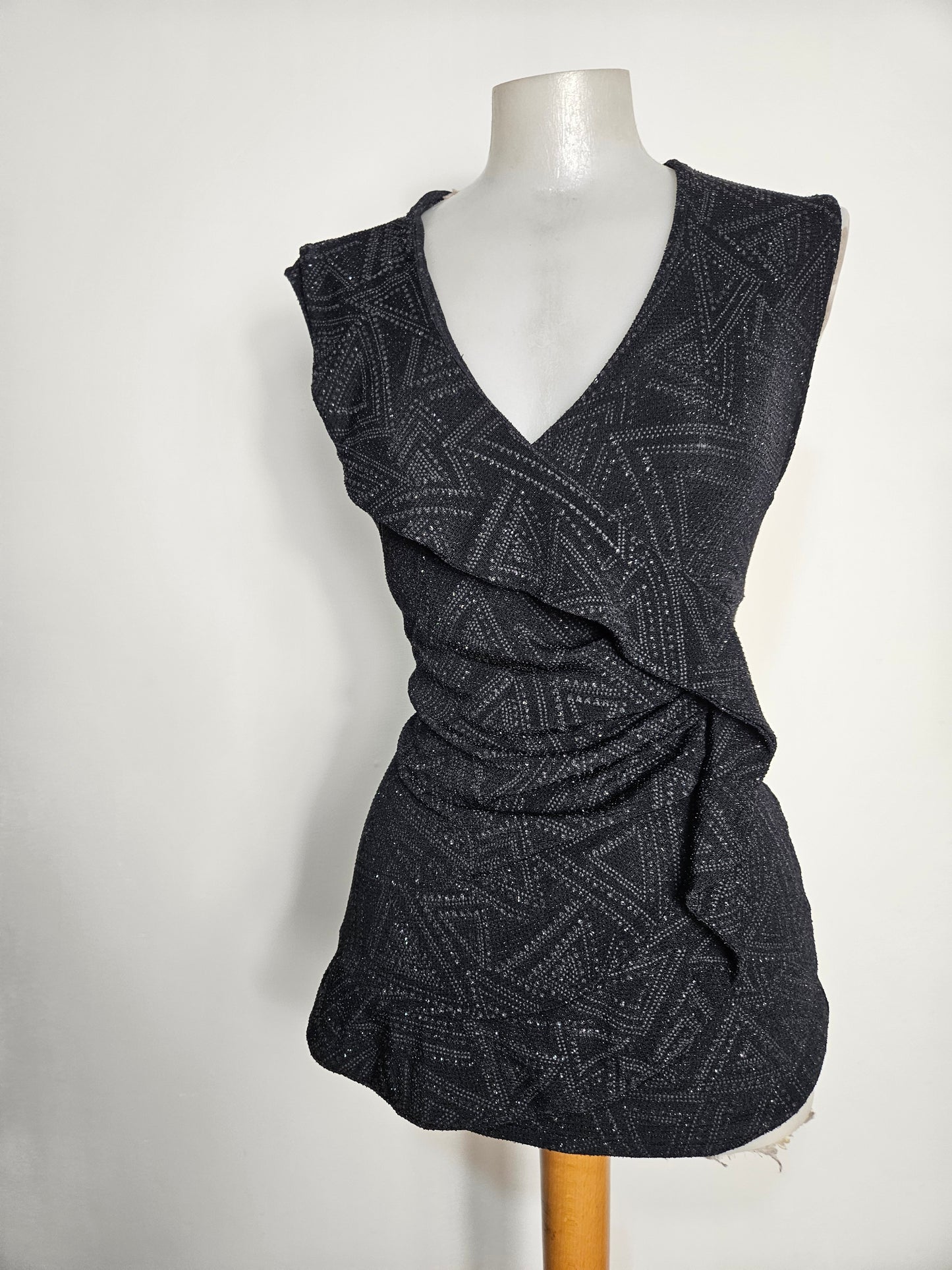 Top with ruffles and rhinestones