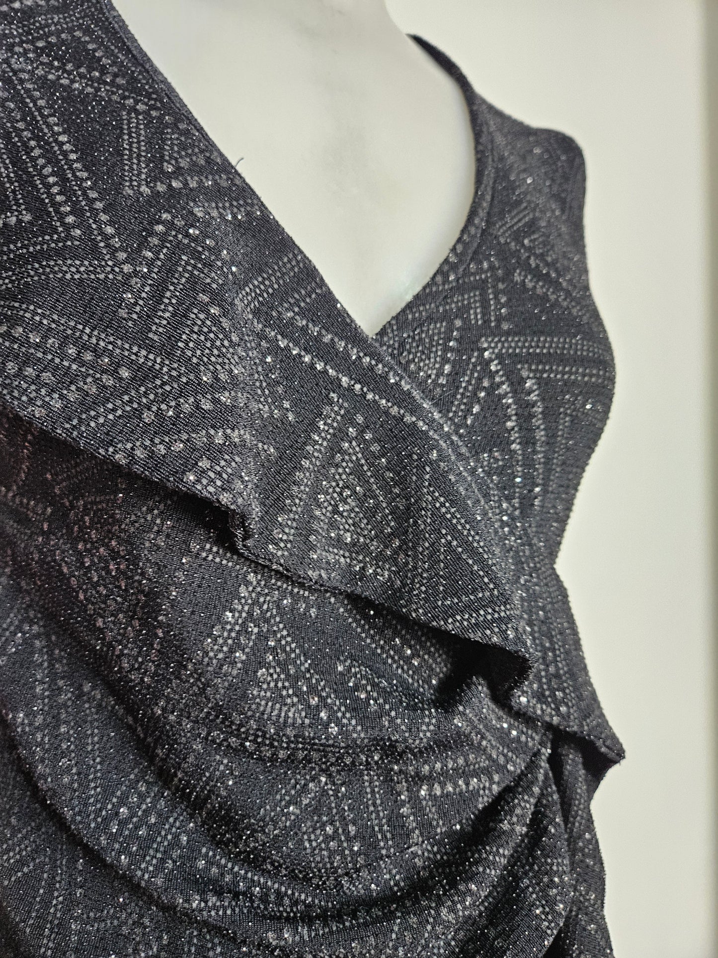 Top with ruffles and rhinestones