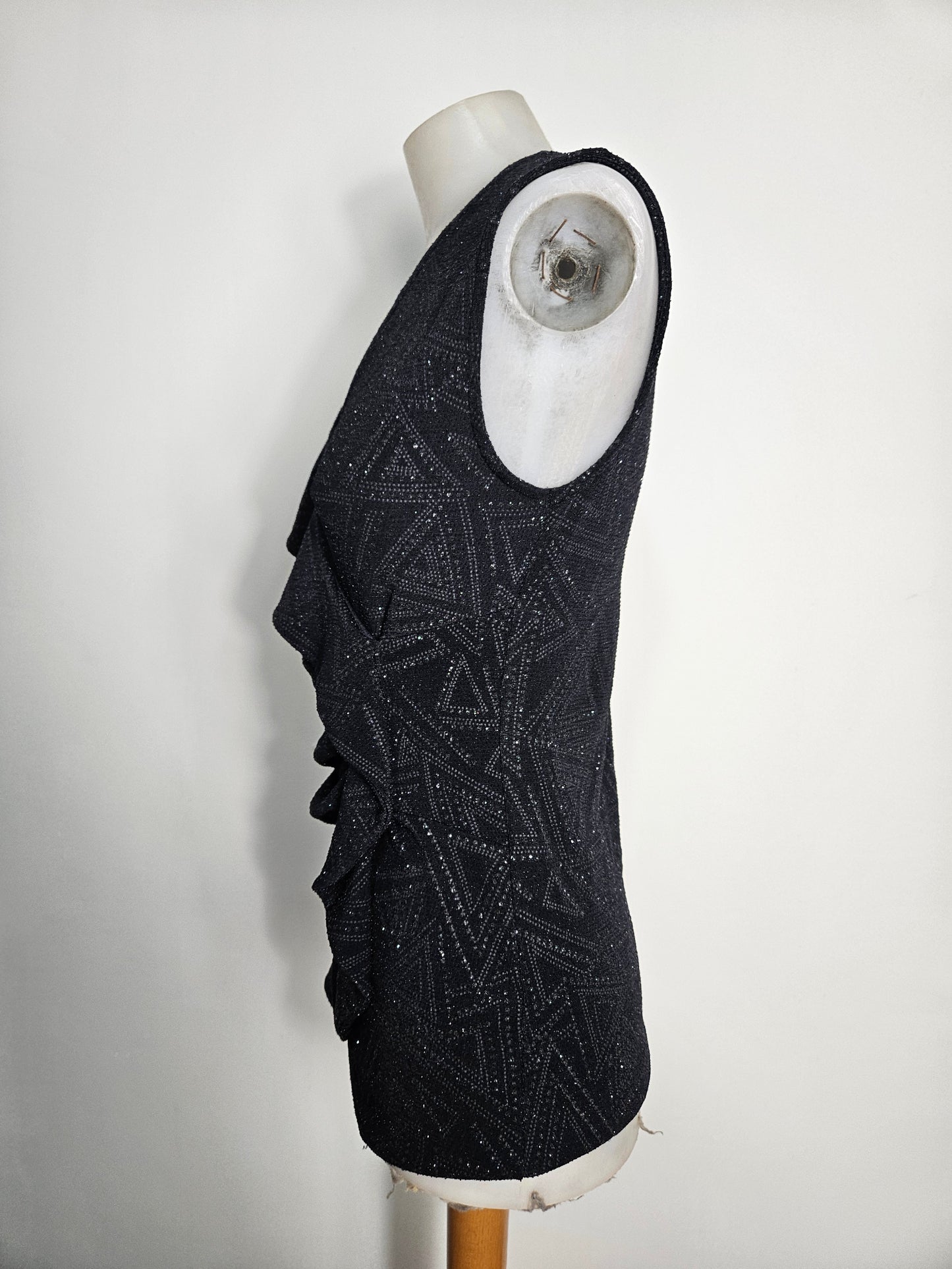 Top with ruffles and rhinestones