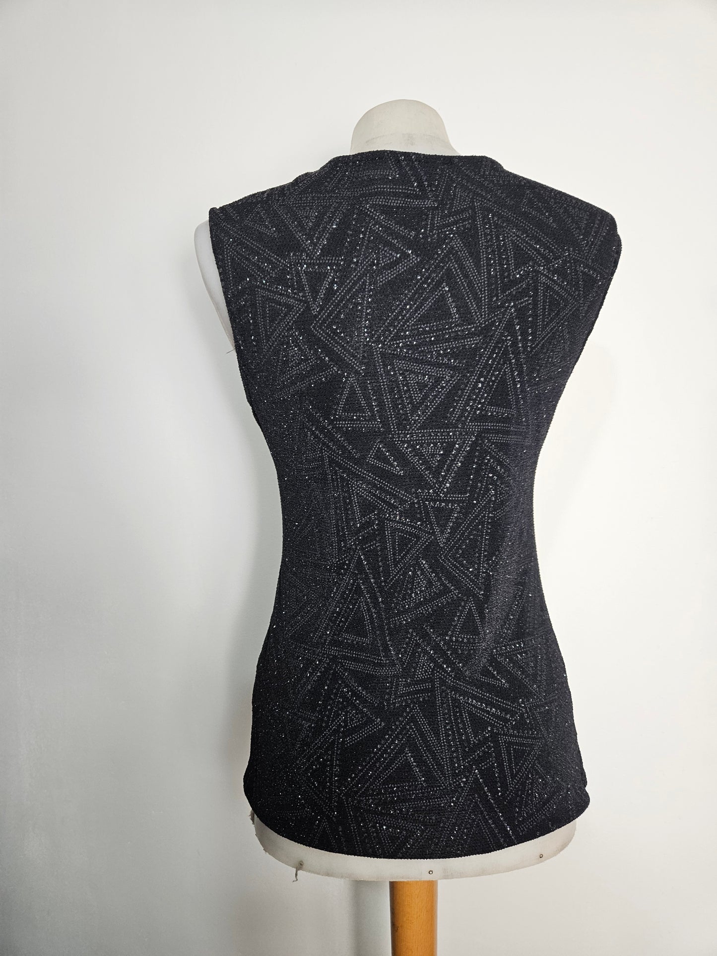 Top with ruffles and rhinestones