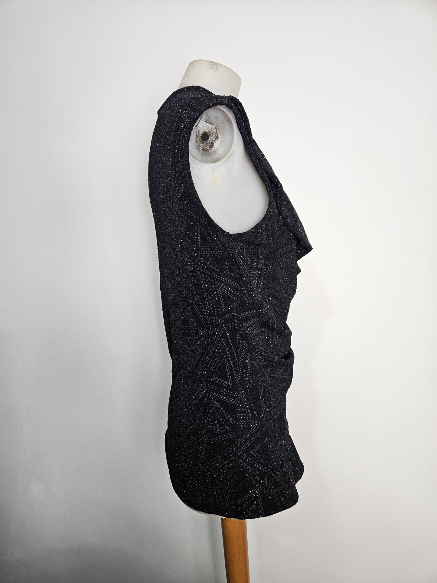 Top with ruffles and rhinestones