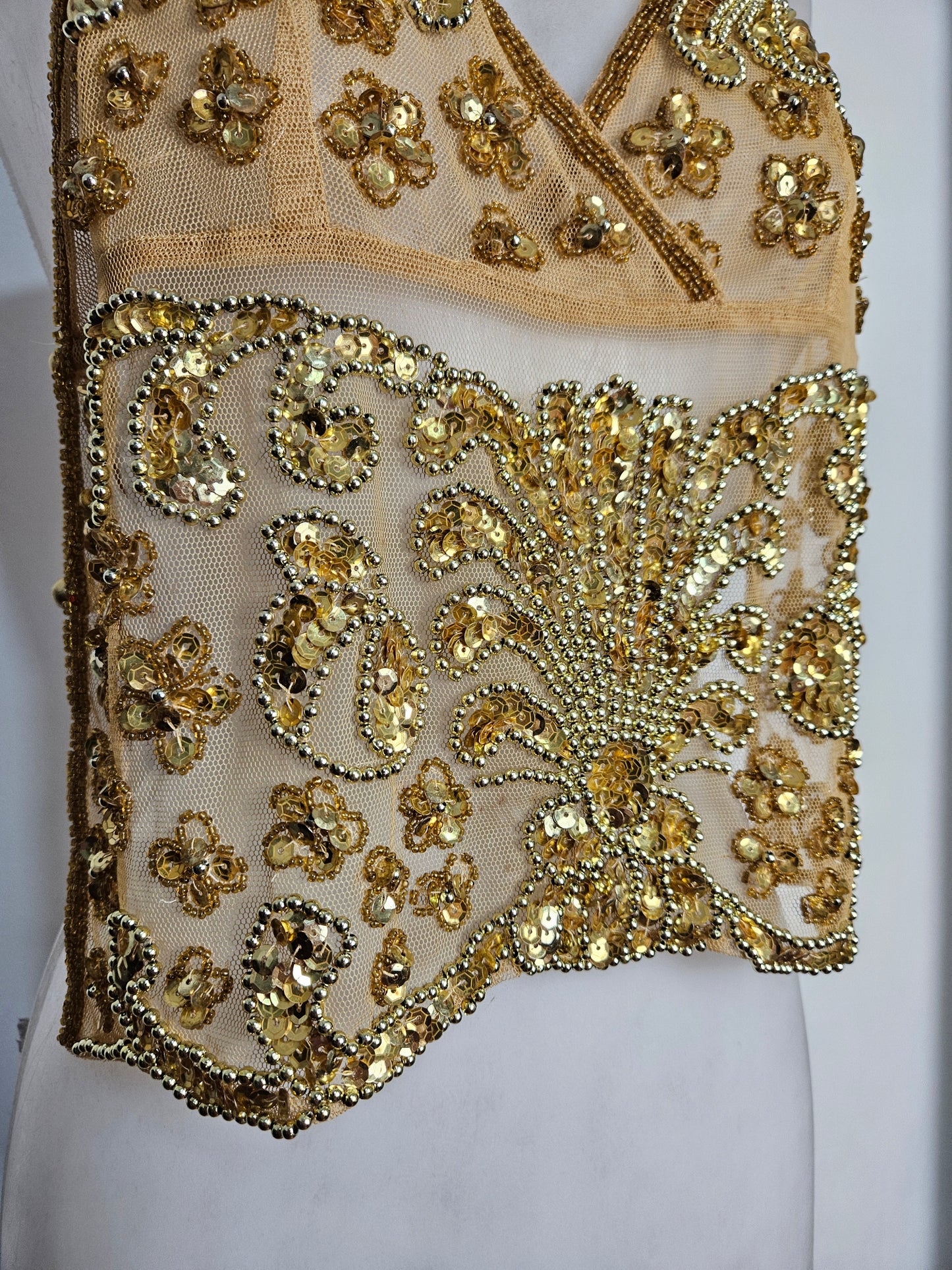 Open back in gold embroidered voile