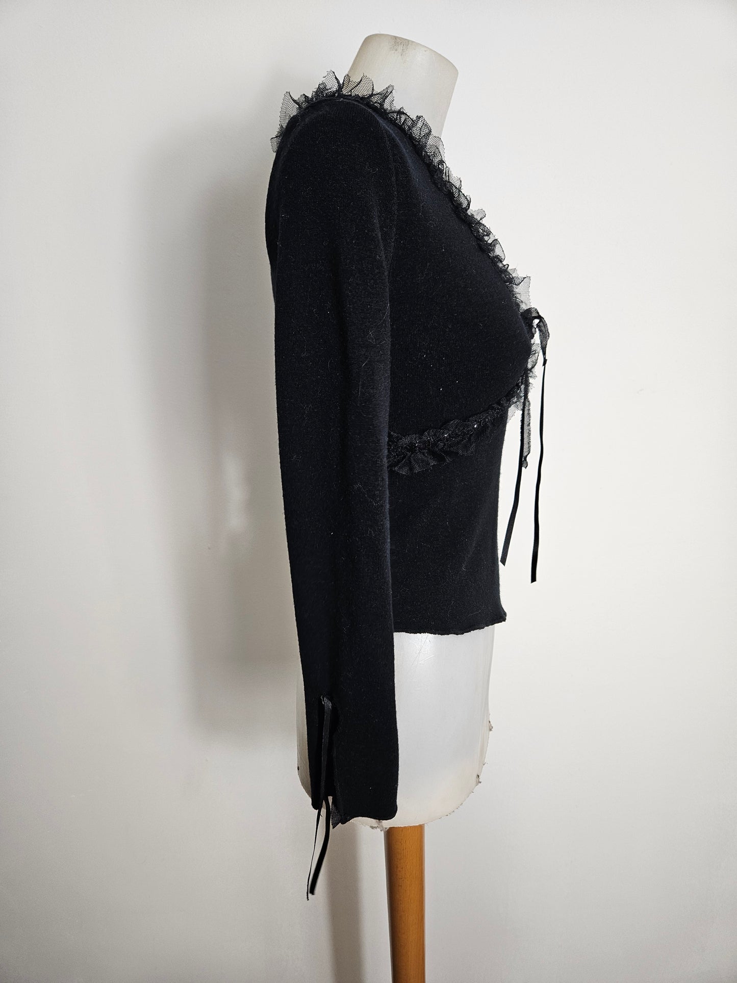 Pull noir à détails