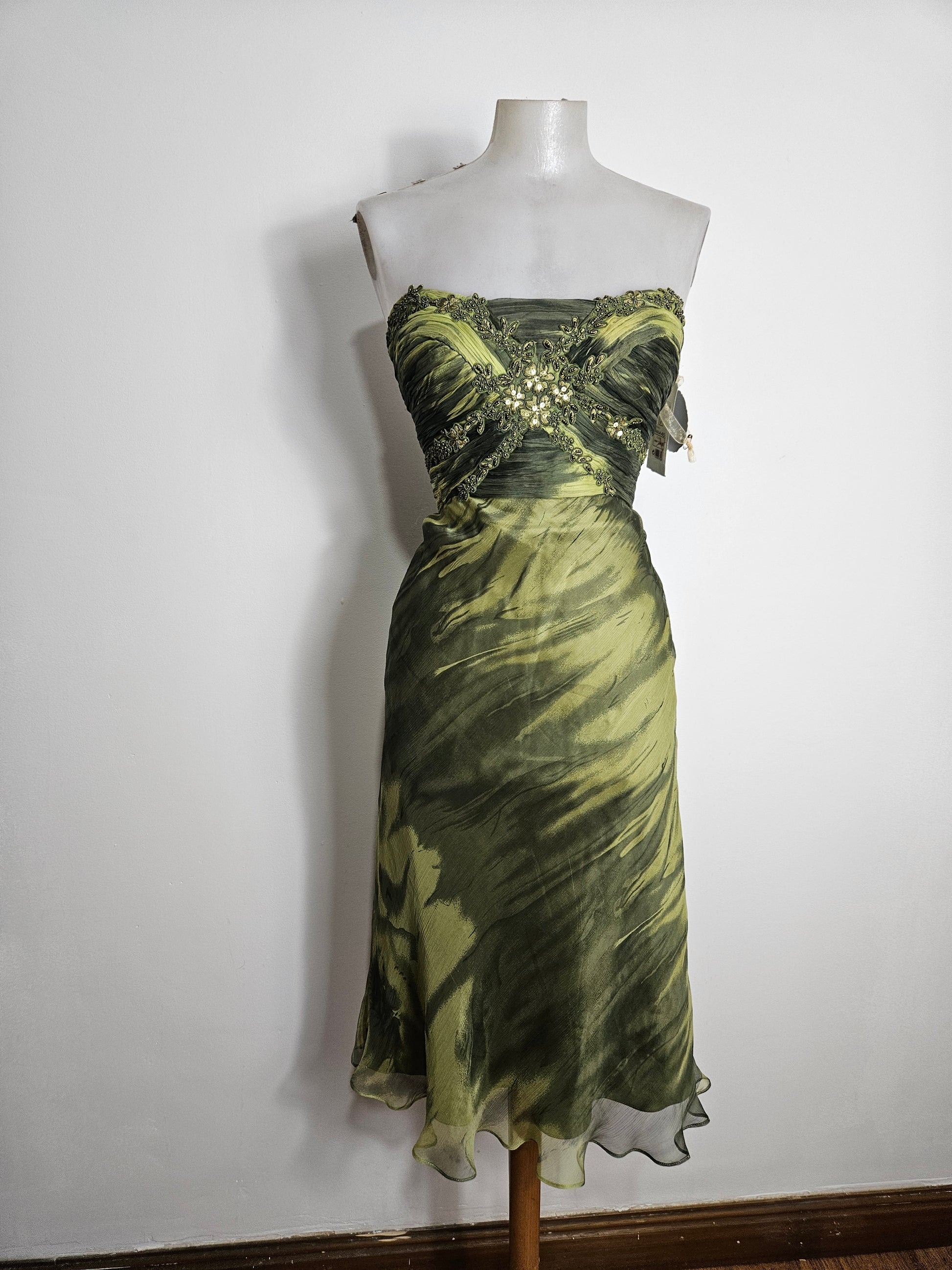 Vintage strapless midi dress in olive green mossy print with beaded floral bodice embellishment and ethereal fairycore lettuce edge hem. photographed on mannequin against neutral background by Lucid Dream 2007