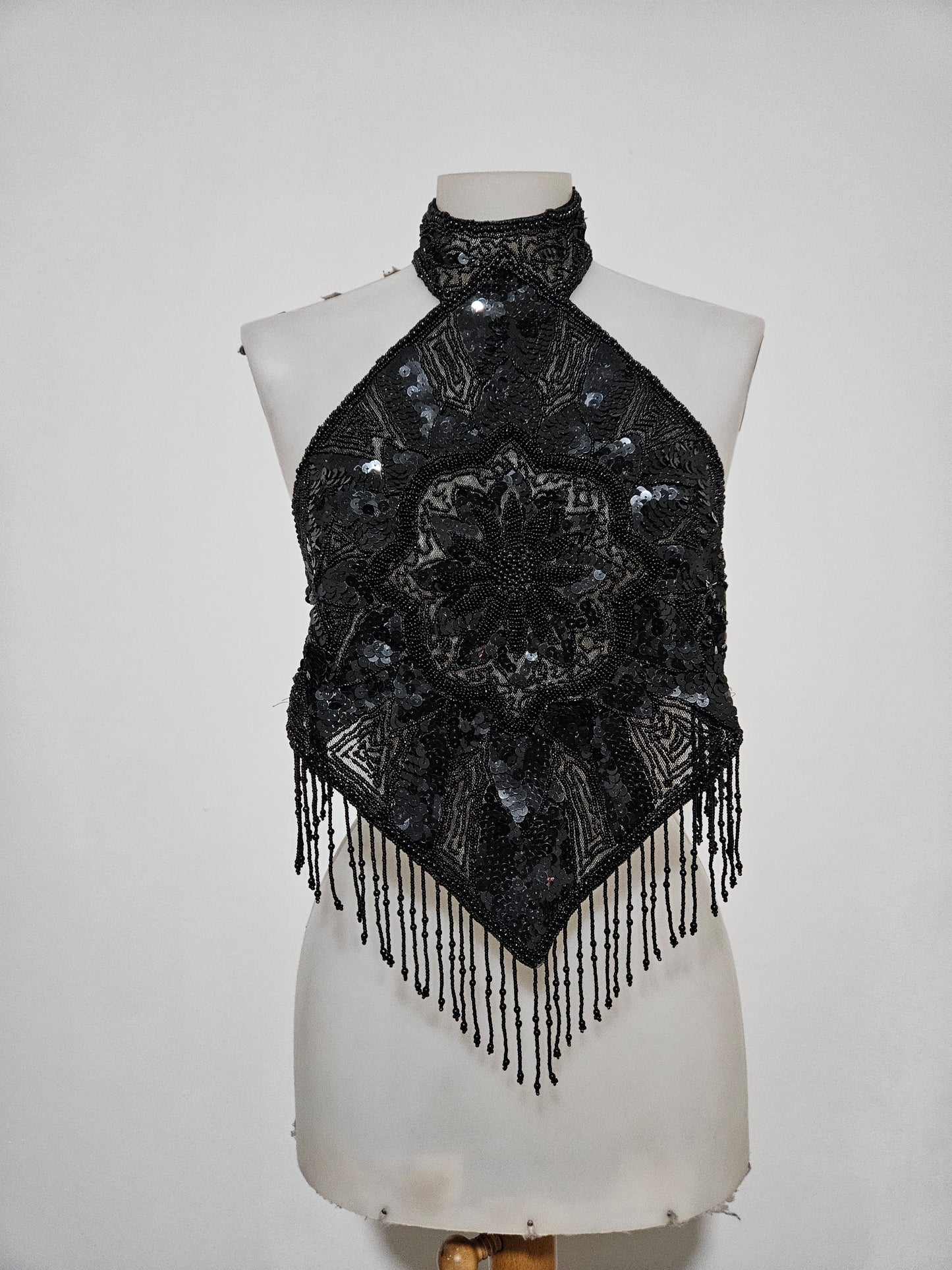 Black open back embroidered with sequins
