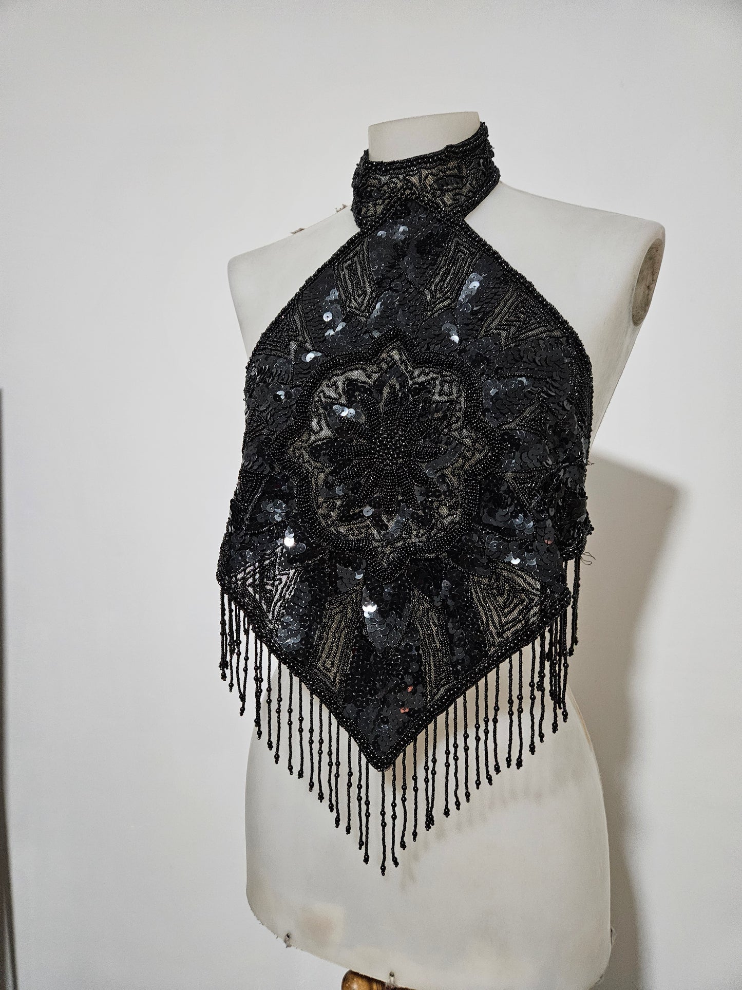 Black open back embroidered with sequins