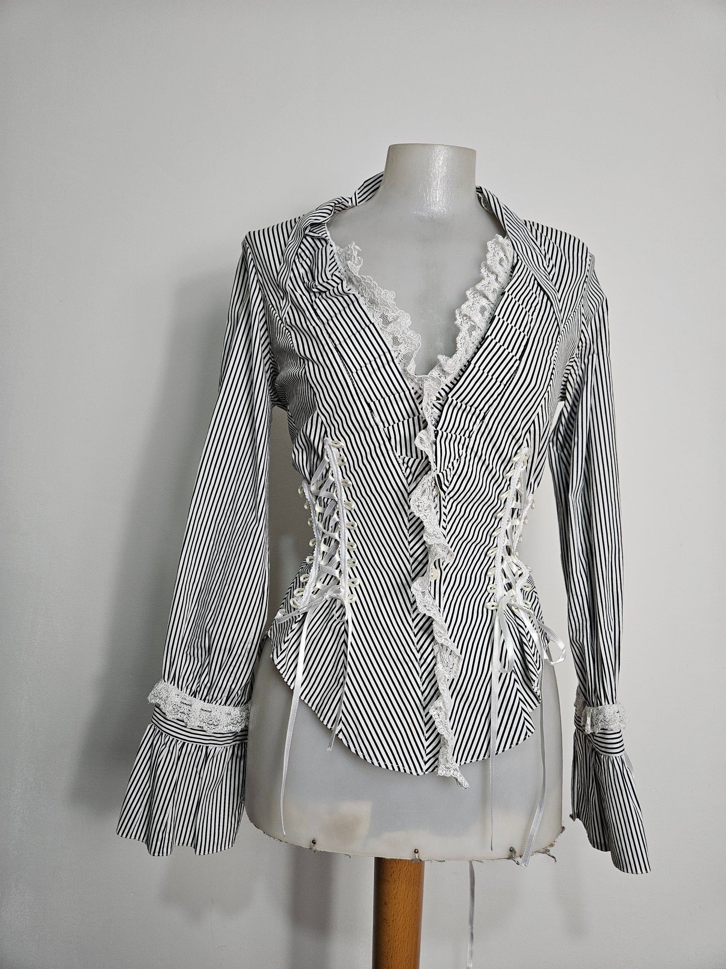 Striped shirt with lace-up detailing