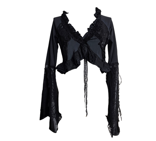 A delicate whimsigoth sheer black lace bolero with dramatic bell sleeves and tiered ruffles. Featuring dainty satin ribbon ties at the front for a perfect dark fairycore and Y2K aesthetic.