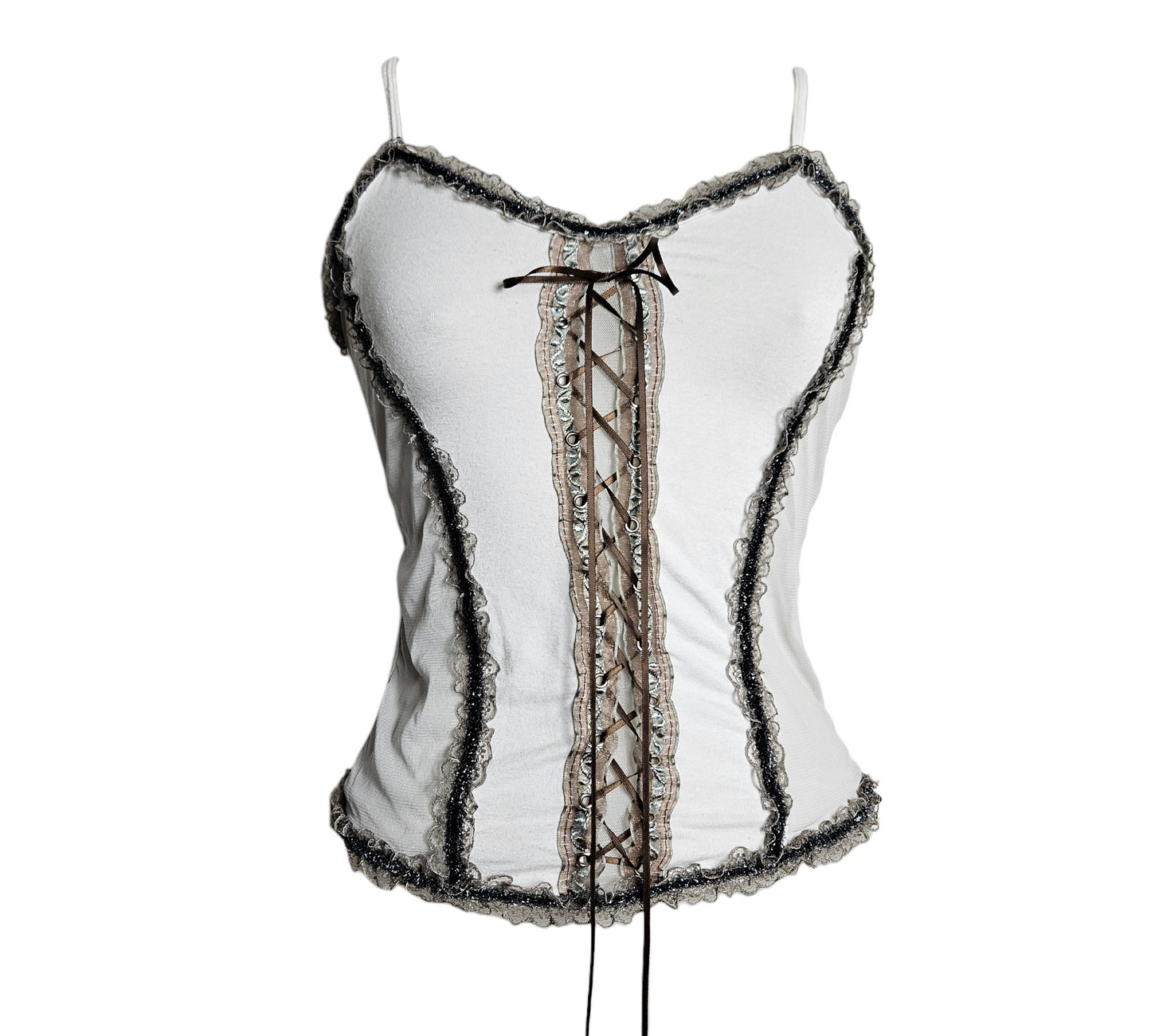 A dreamy Y2K aesthetic white camisole with earthy brown ribbon lacing and delicate whimsical lace trims, displayed on a mannequin.