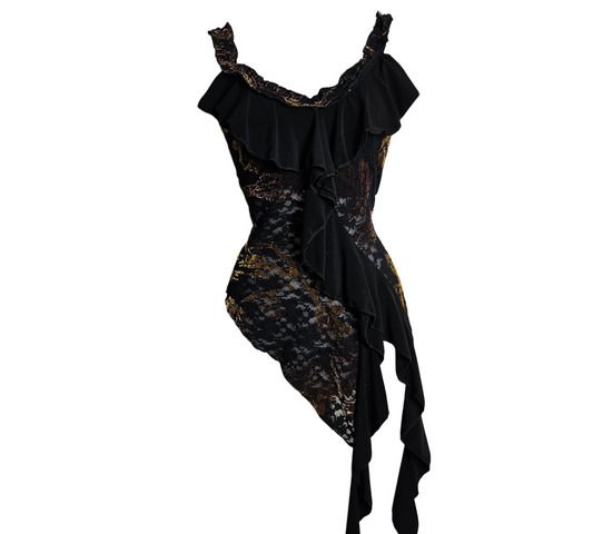A mesmerizing whimsigoth asymmetric top featuring dark floral lace over bronze metallic patterns. A dramatic black ruffle cascades down the front, creating a mystical and moody reverie aesthetic.
