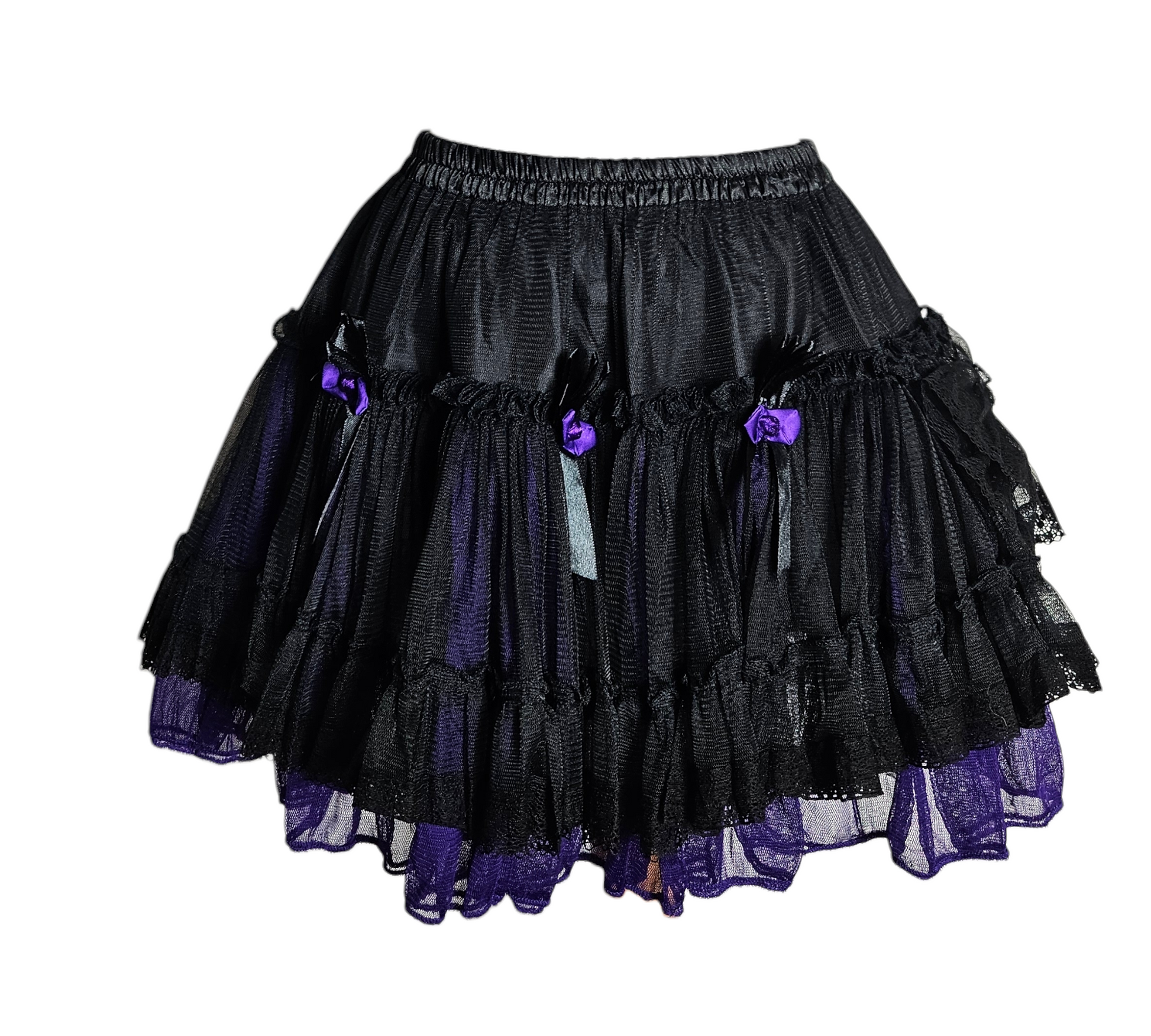 Black and purple vintage tulle mini skirt with layered ruffles and small bows, fairycore and whimsigoth Y2K aesthetic, playful dark romantic vibe.