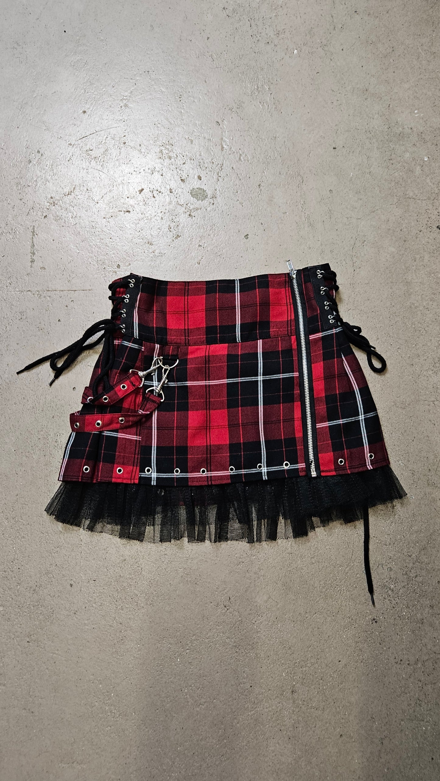 Mini jupe tartan à sangles