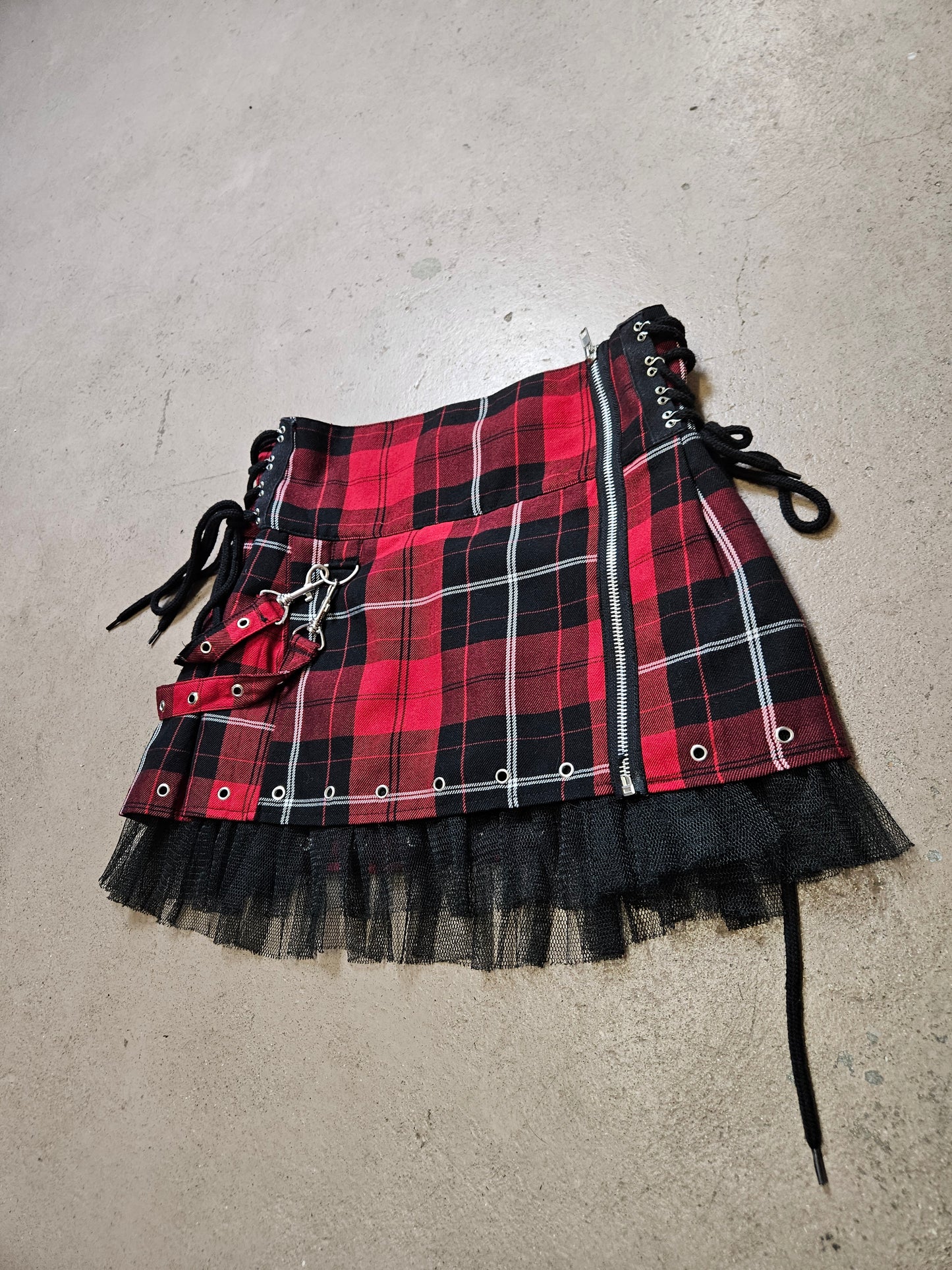Mini jupe tartan à sangles