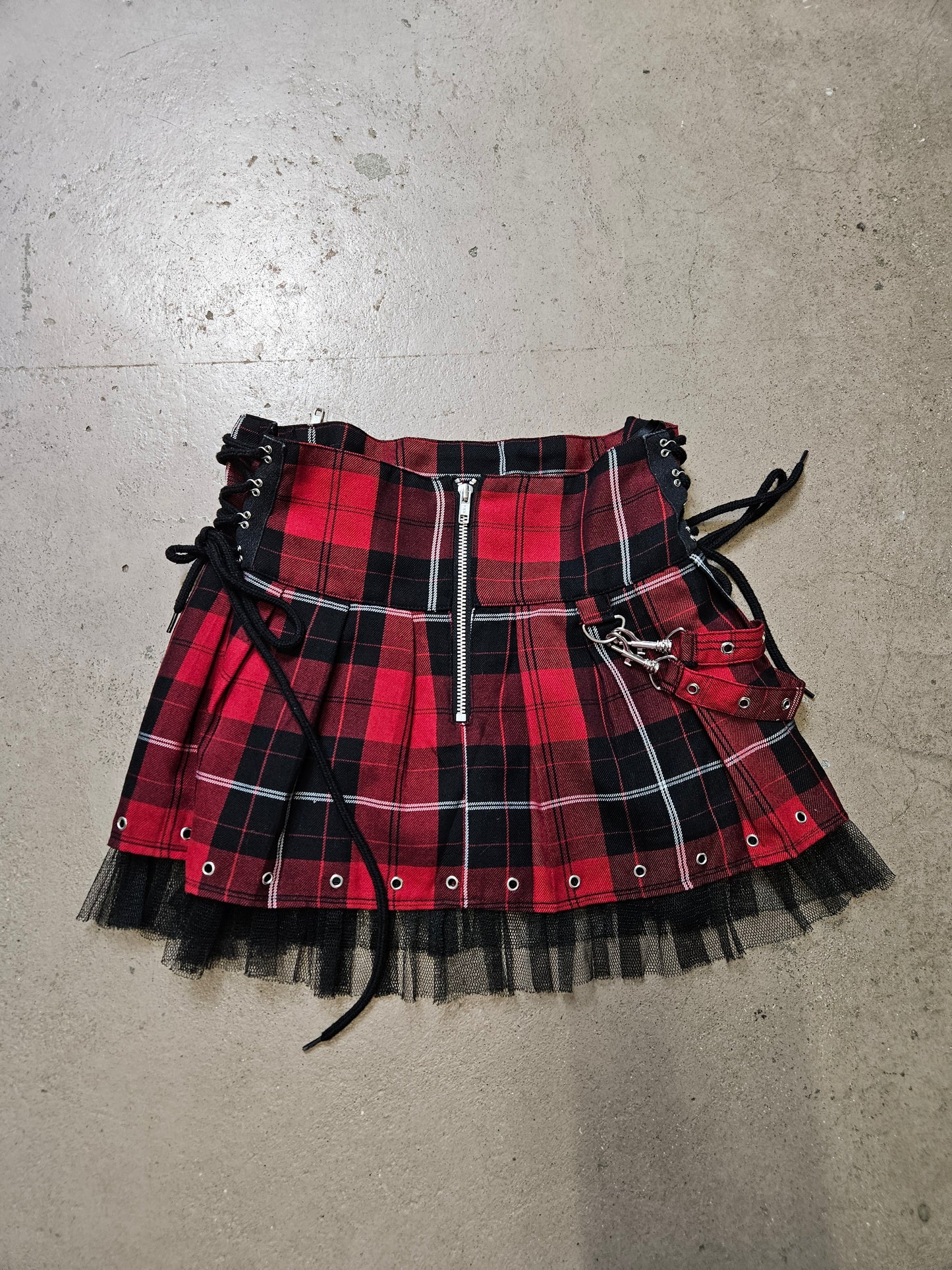 Mini jupe tartan à sangles
