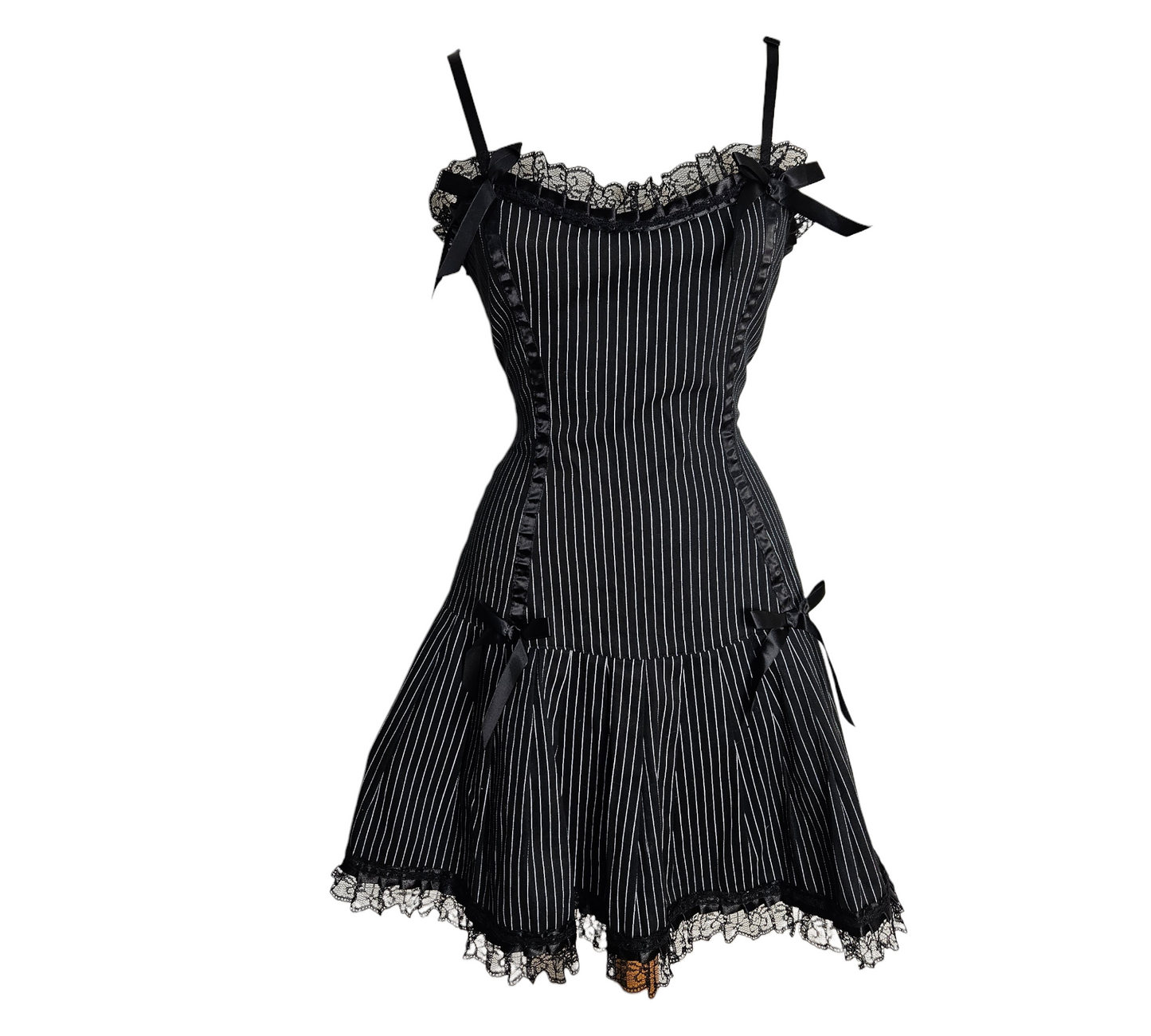 Vintage black pinstripe mini dress with lace trim and ribbon bows, cute Y2K fairycore and whimsigoth aesthetic with a playful gothic touch.